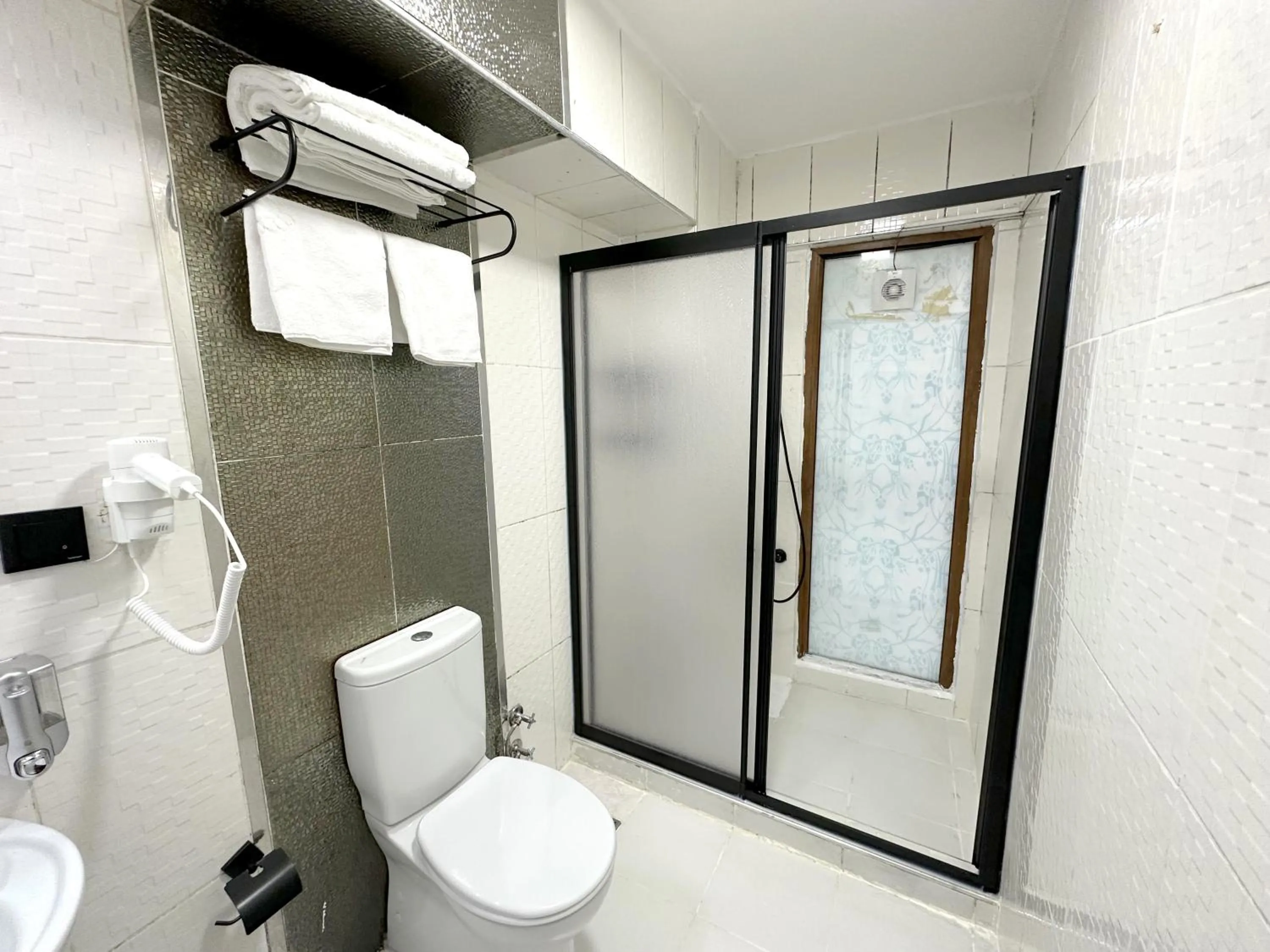 Shower in Menesa Hotel