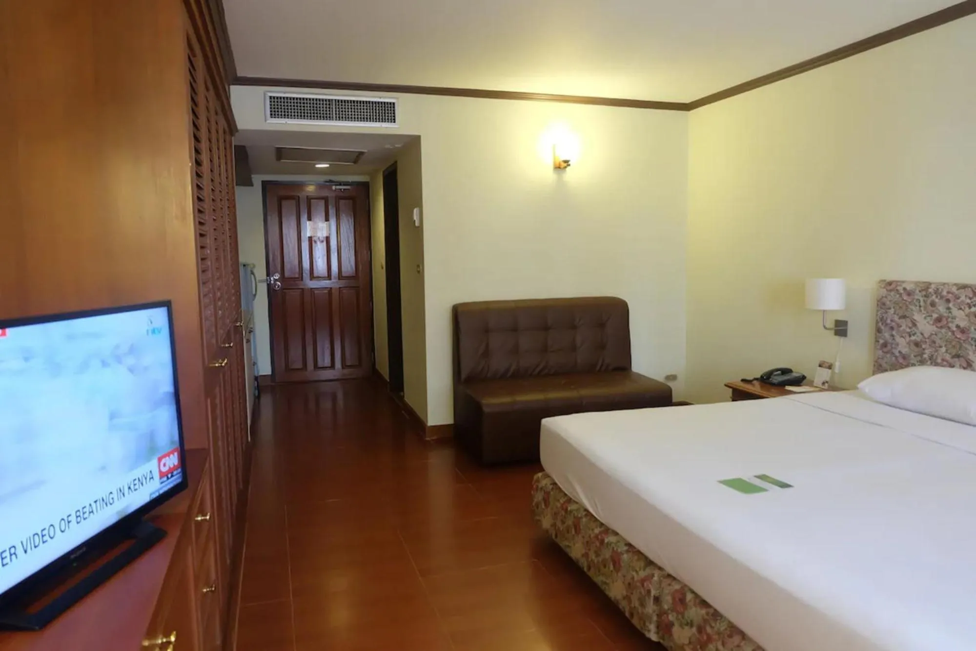 Bed in Omni Tower Cozy Apartments by Direct Rooms