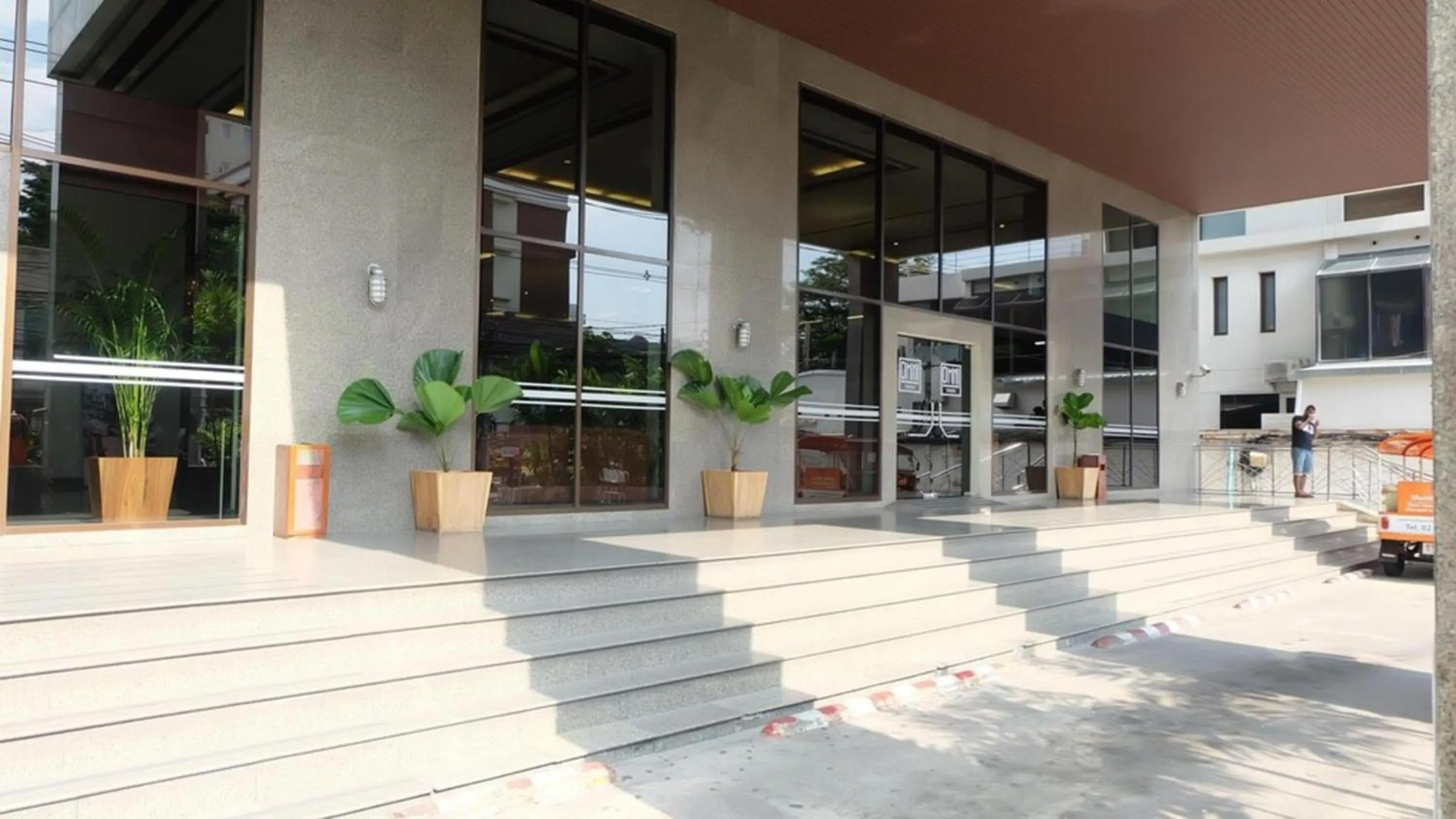 Property building in Omni Tower Cozy Apartments by Direct Rooms