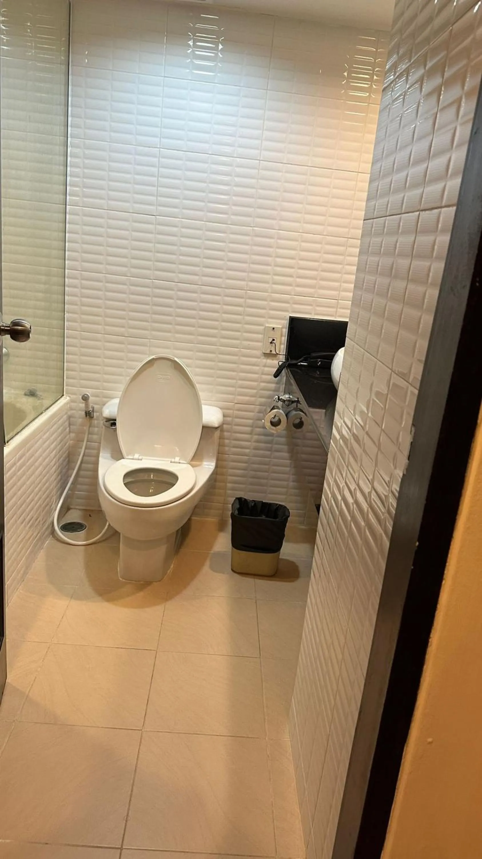 Toilet in Omni Tower Cozy Apartments by Direct Rooms
