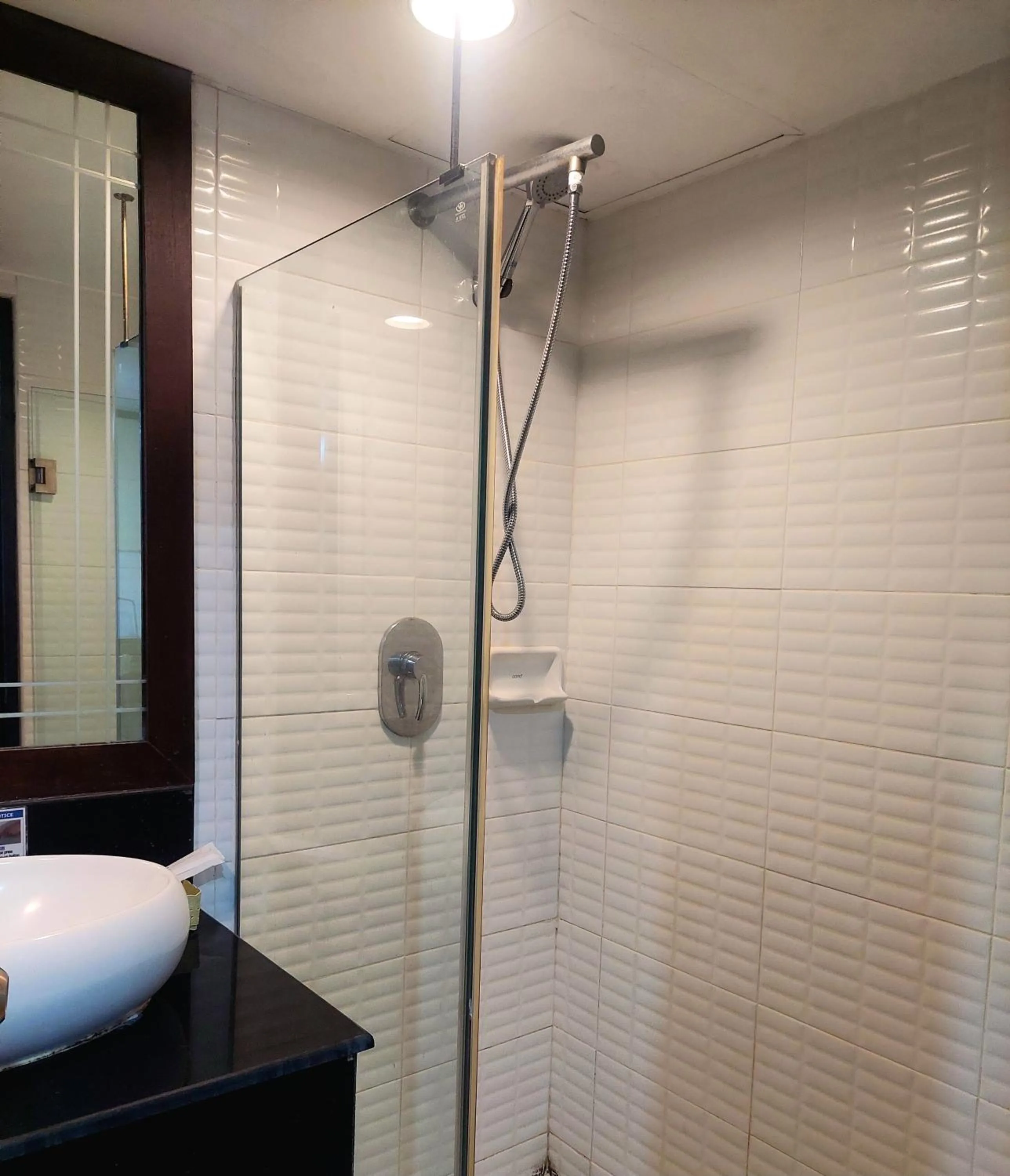 Shower in Omni Tower Cozy Apartments by Direct Rooms