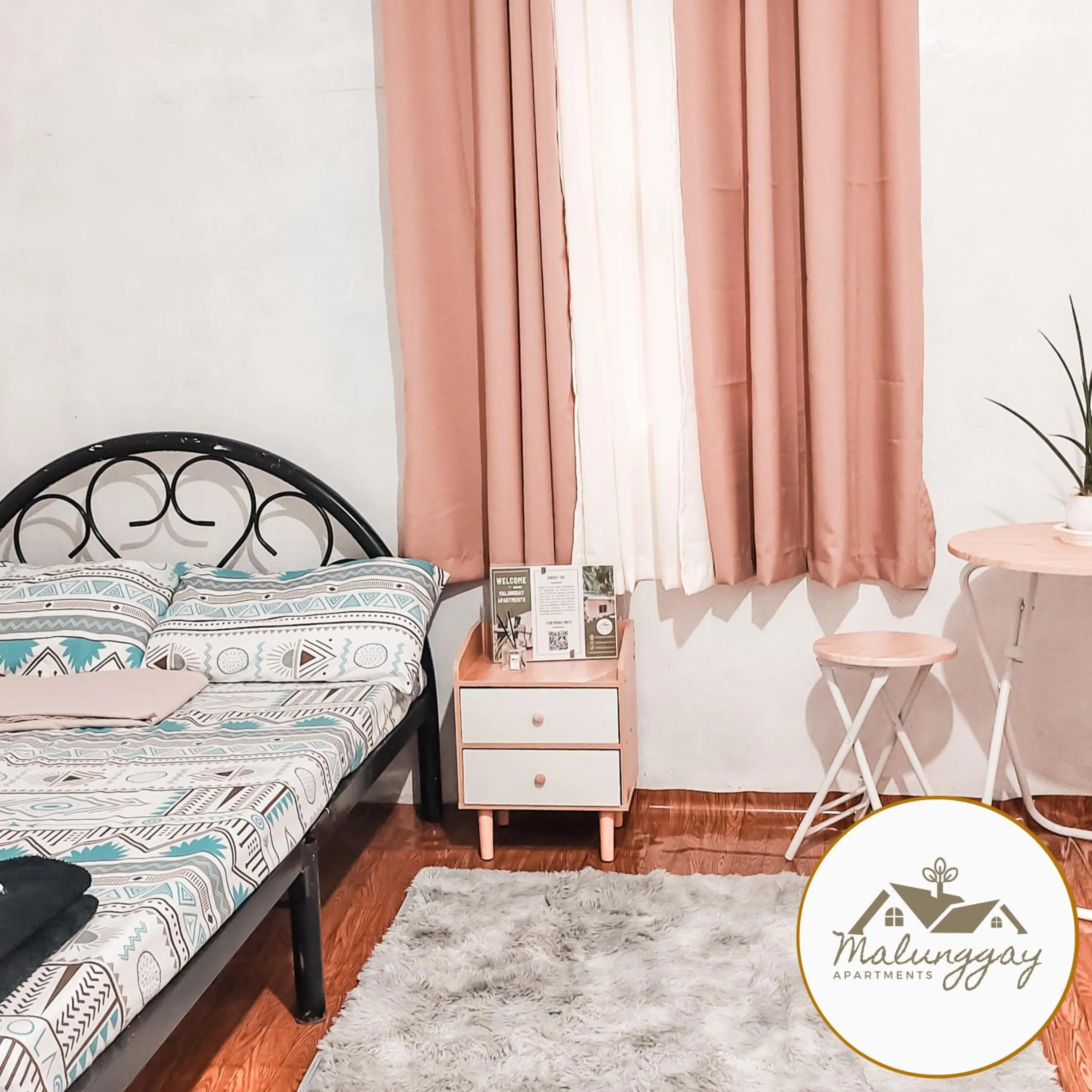 Bed in Malunggay Apartments