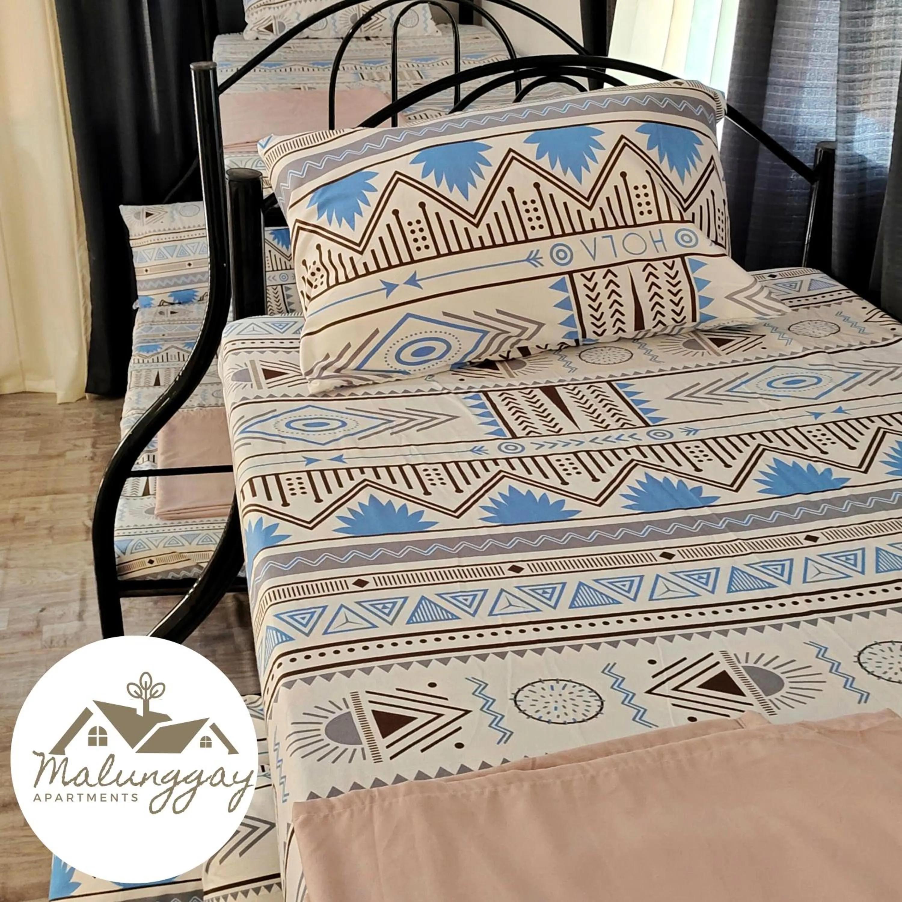 Bed in Malunggay Apartments