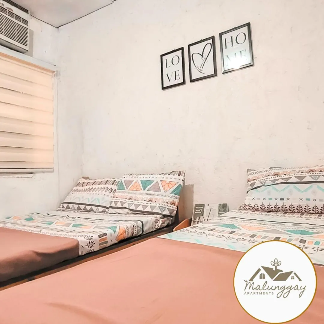 Bed in Malunggay Apartments