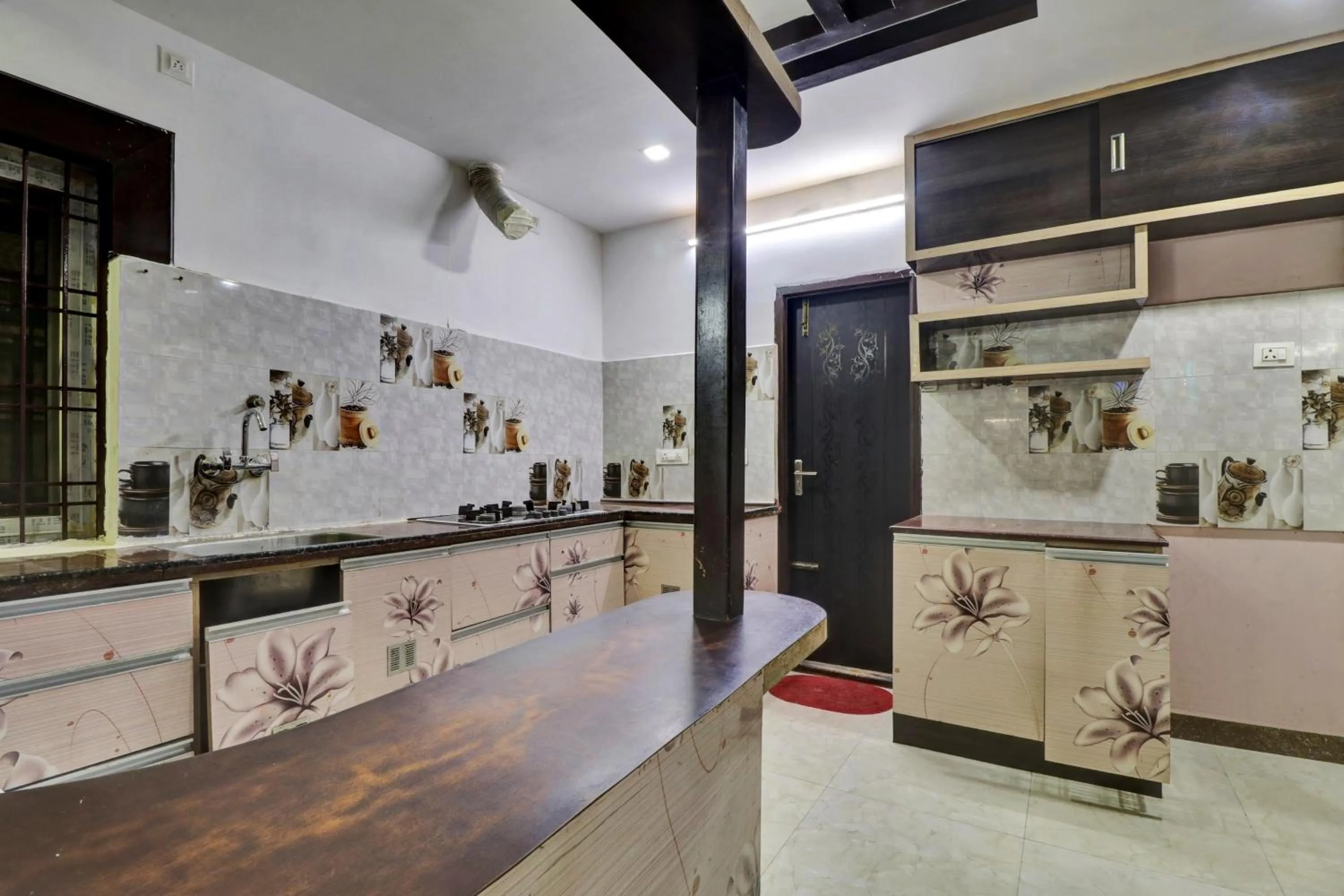 Kitchen or kitchenette in Hotel O SESHADRI HOMESTAY
