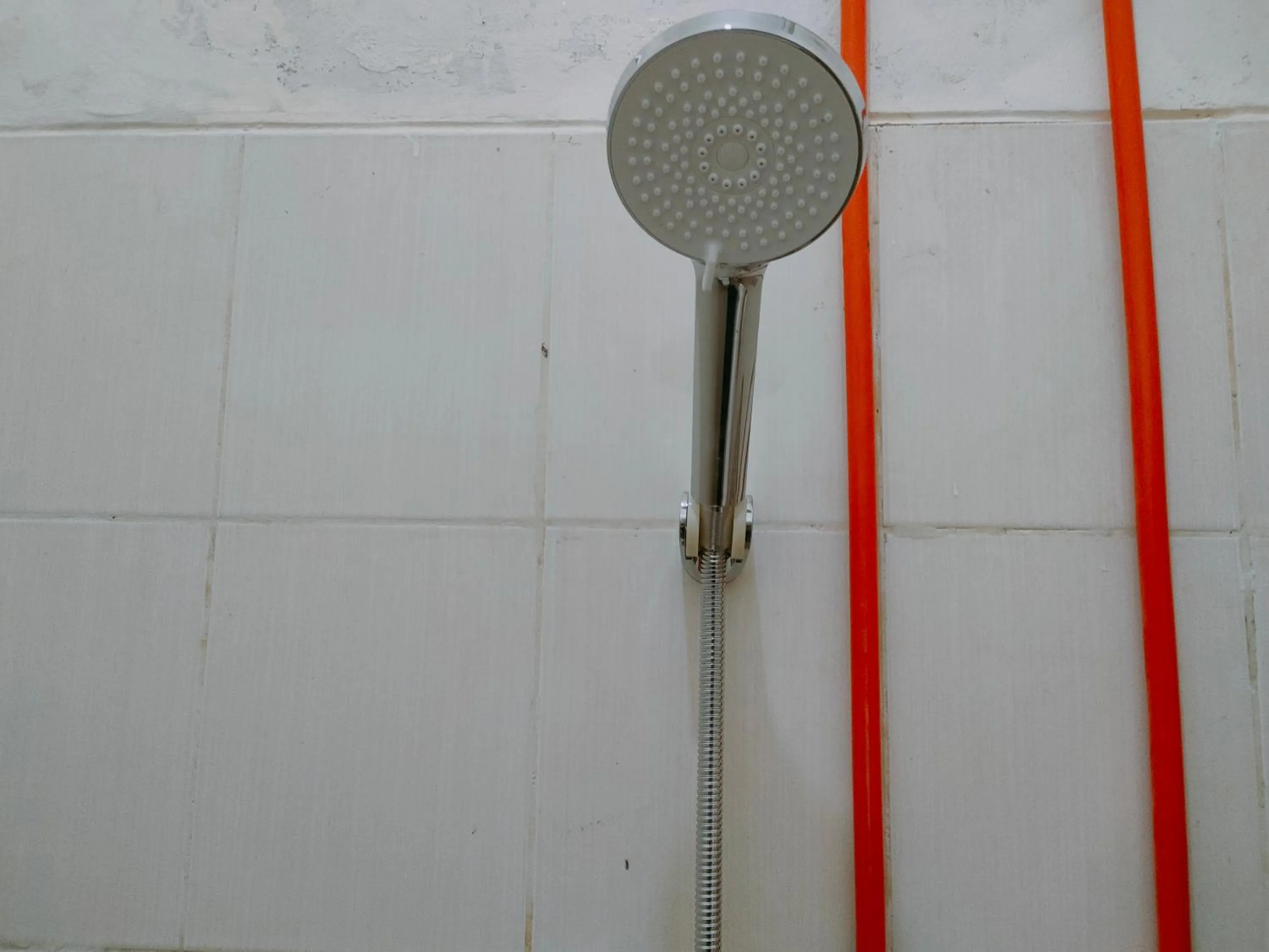 Bathroom in RedDoorz Syariah near Jogja Expo Center