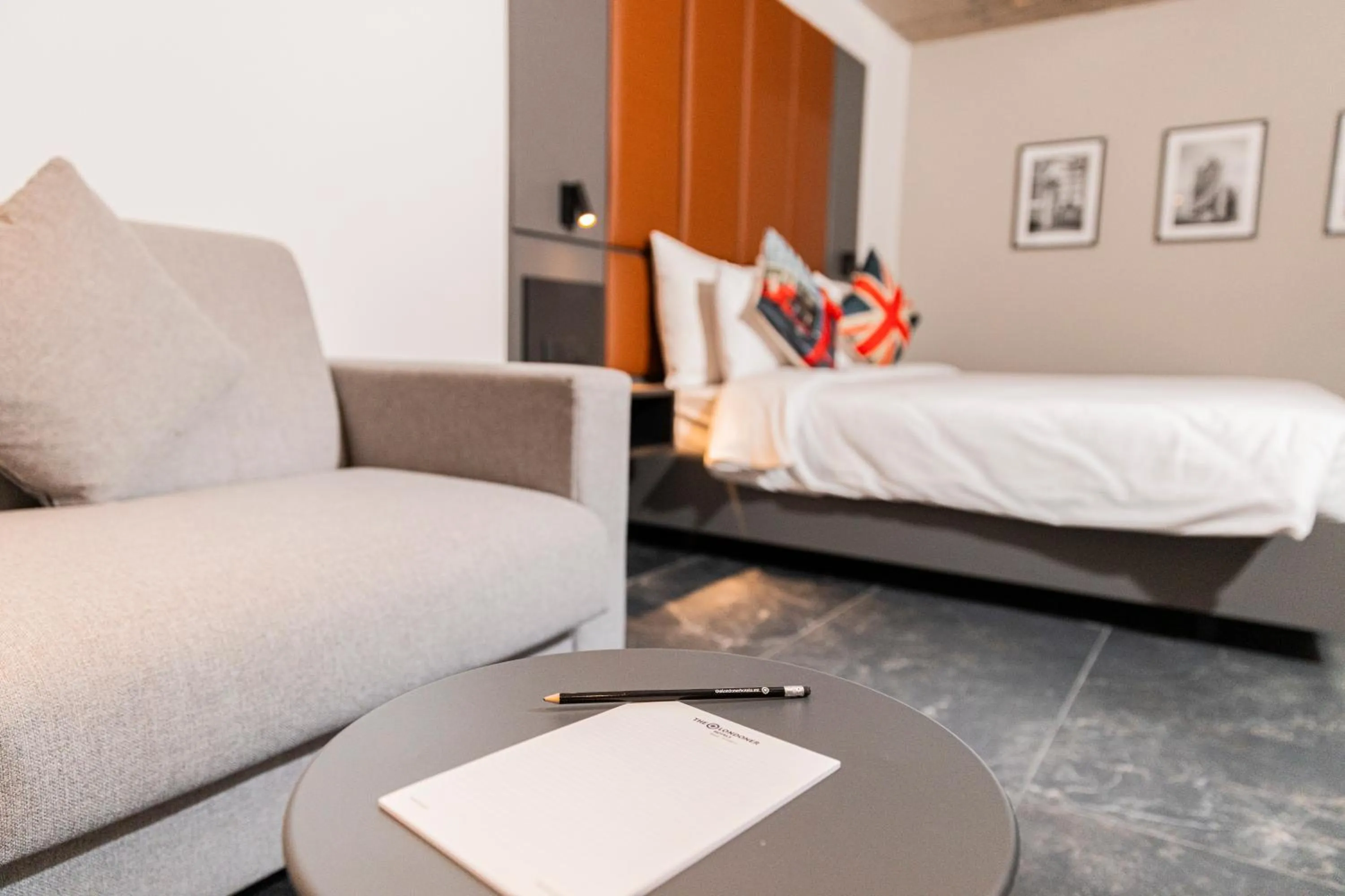 Seating area, Bed in The Londoner Hotel St. Julian's