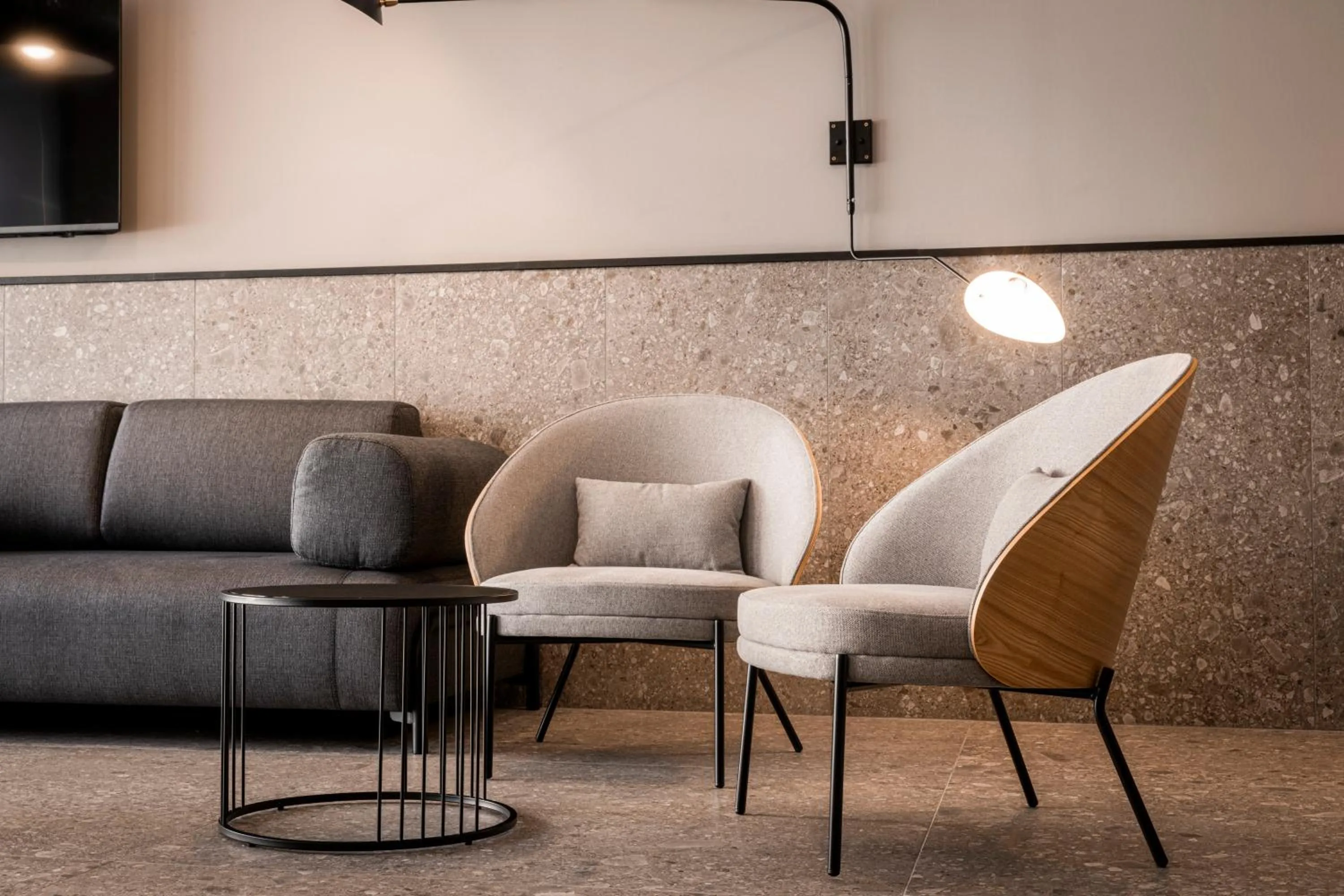 Communal lounge/ TV room in The Londoner Hotel St. Julian's