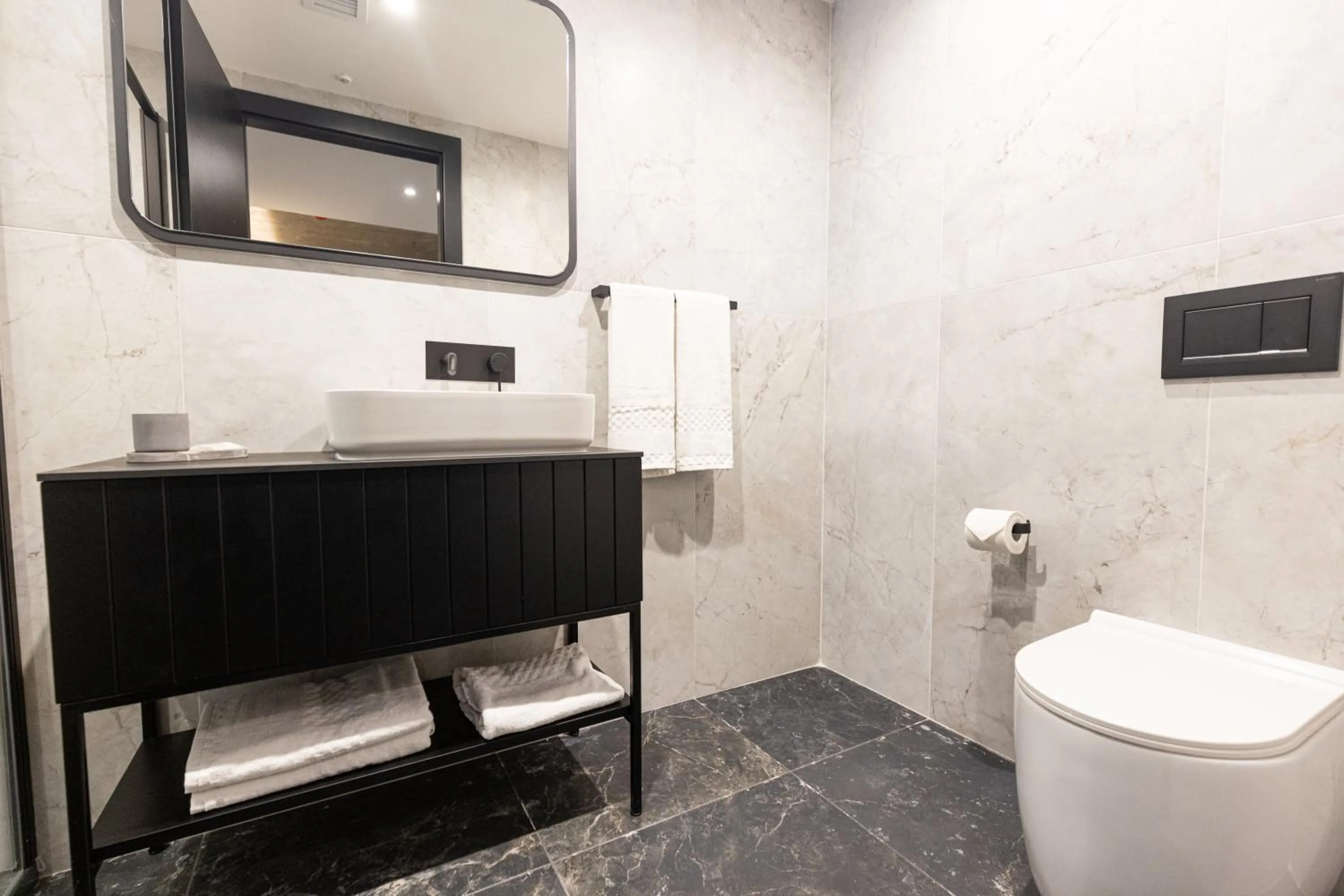 Bathroom in The Londoner Hotel St. Julian's