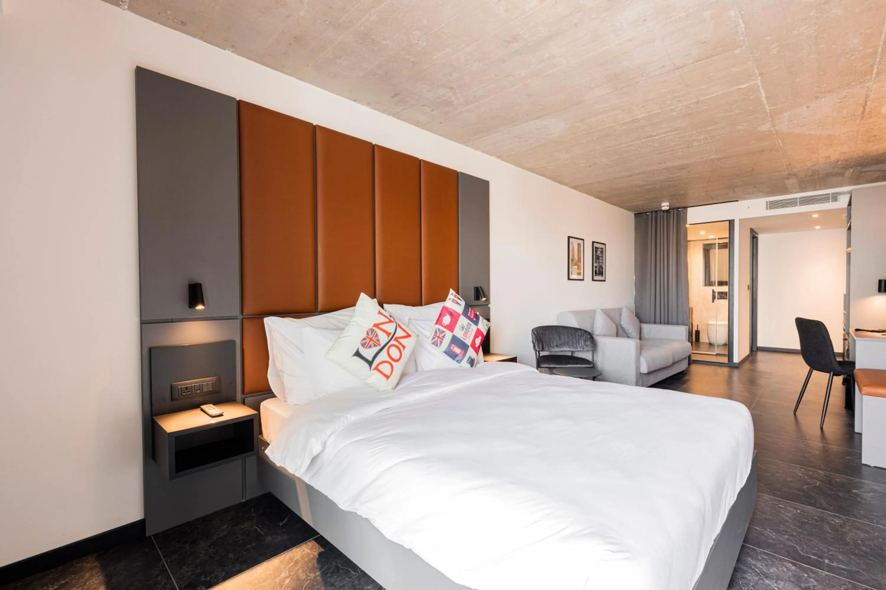 Photo of the whole room, Bed in The Londoner Hotel St. Julian's