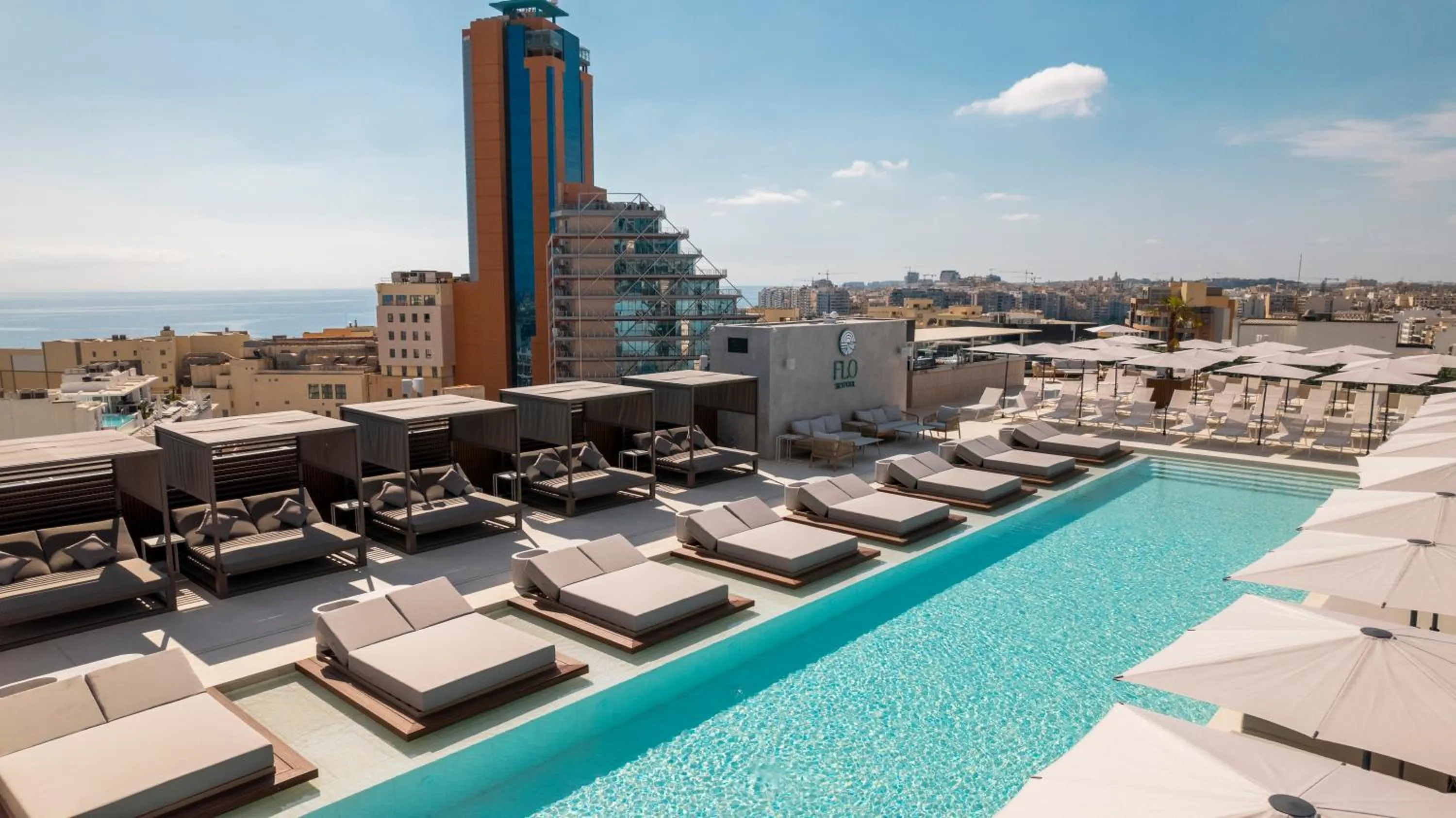 Swimming pool in The Londoner Hotel St. Julian's