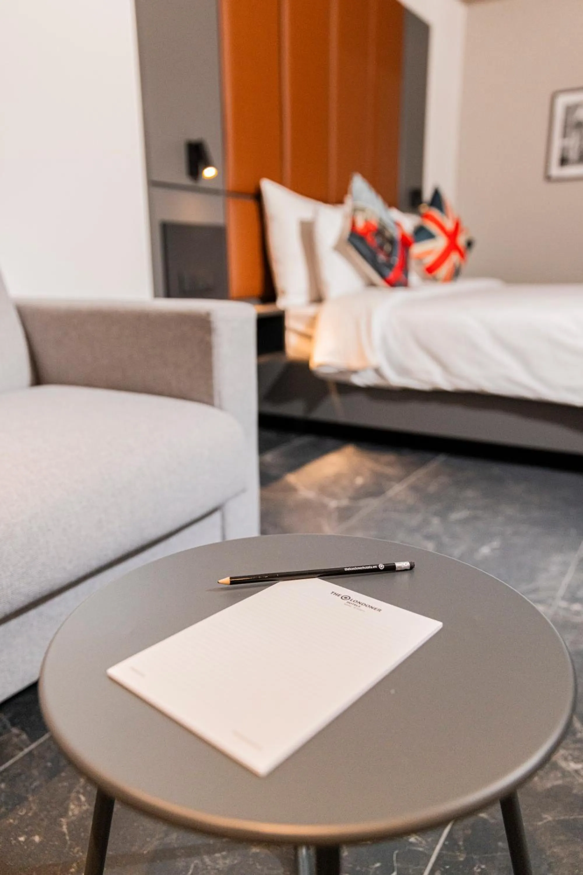 Seating area, Bed in The Londoner Hotel St. Julian's