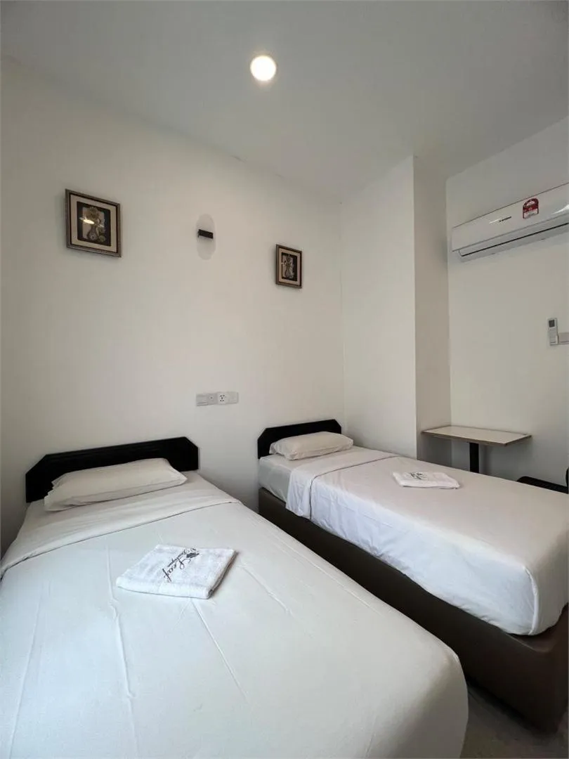 Bed in Srg Indira Hotel