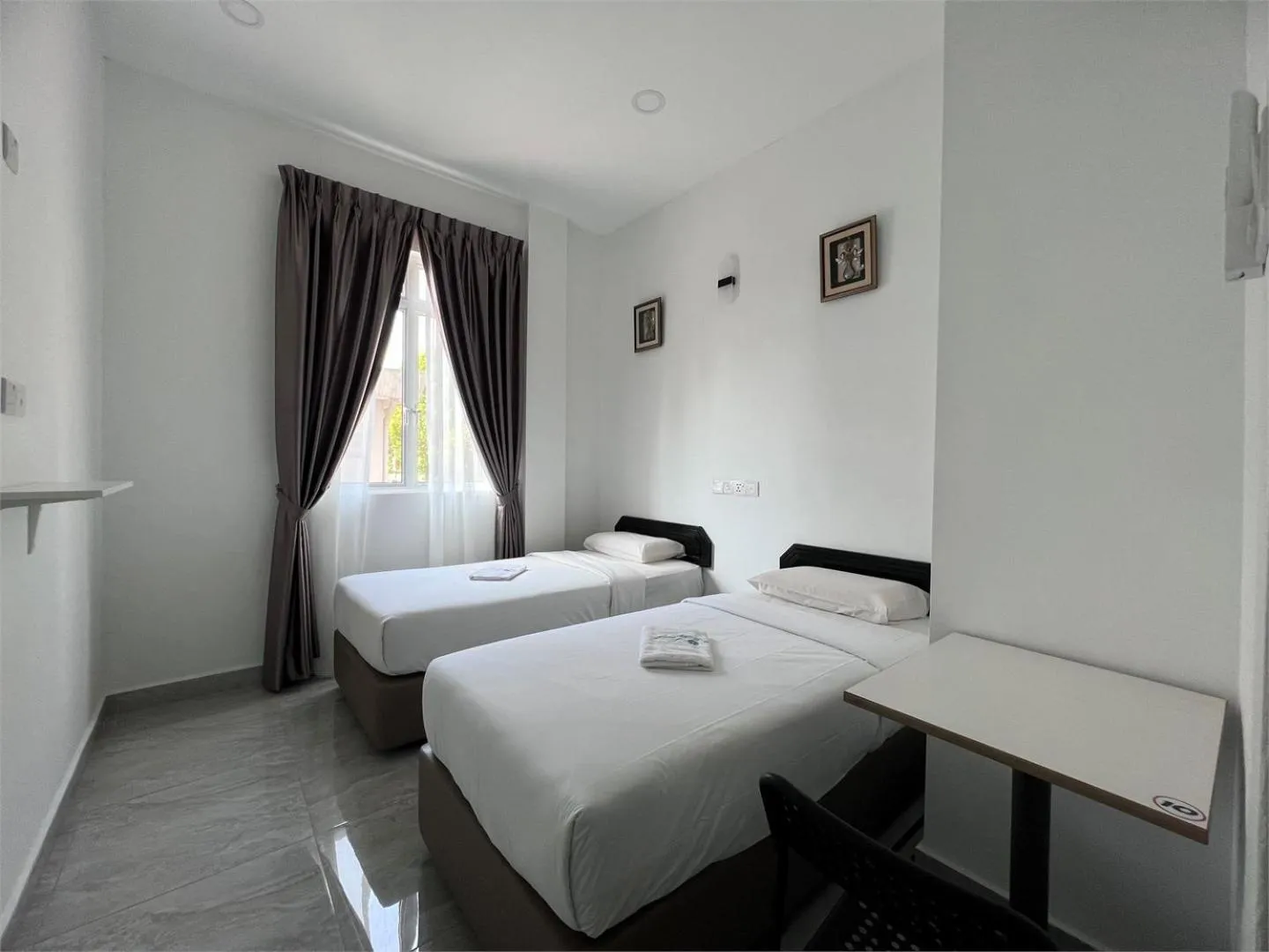 Bed in Srg Indira Hotel