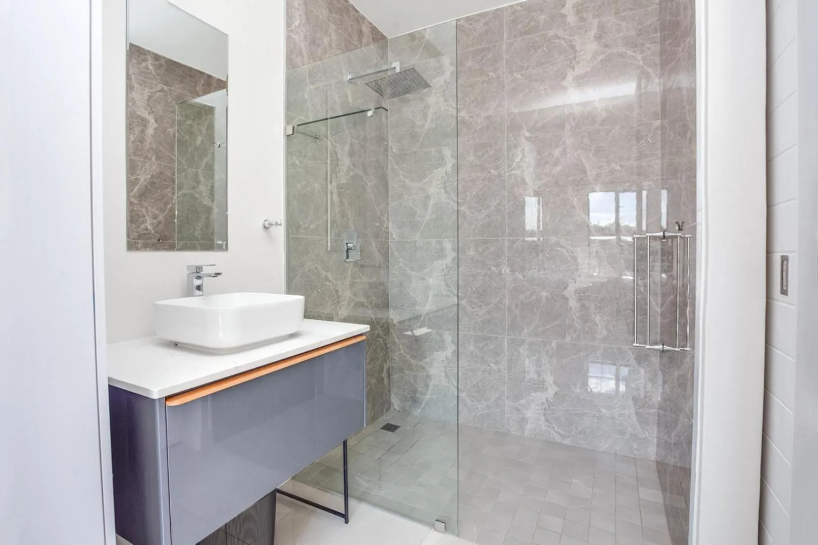 Shower in Urban Oasis Apartments at The Paramount