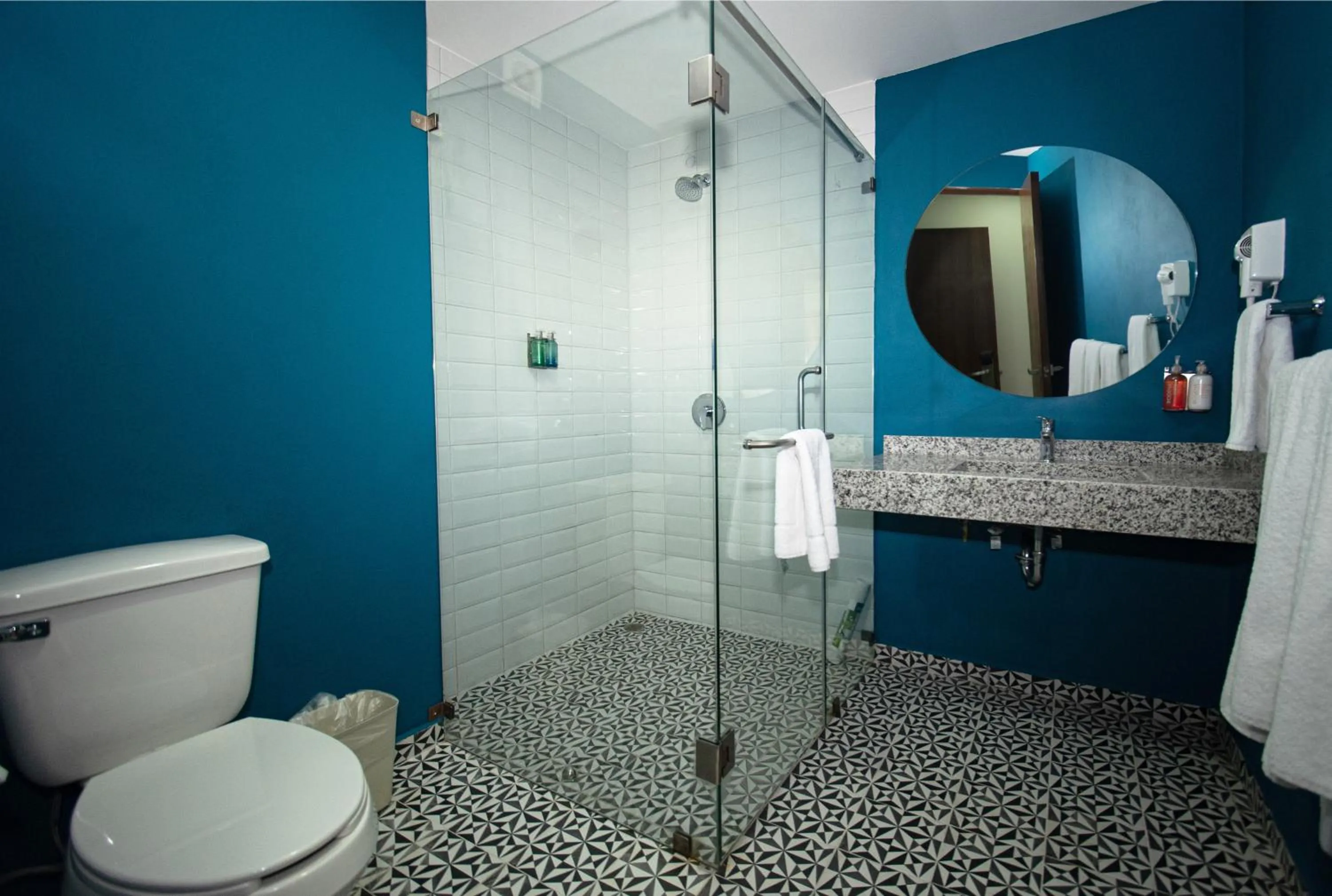 Bathroom in Vista Express Guadalajara Expo SureStay Collection by BW