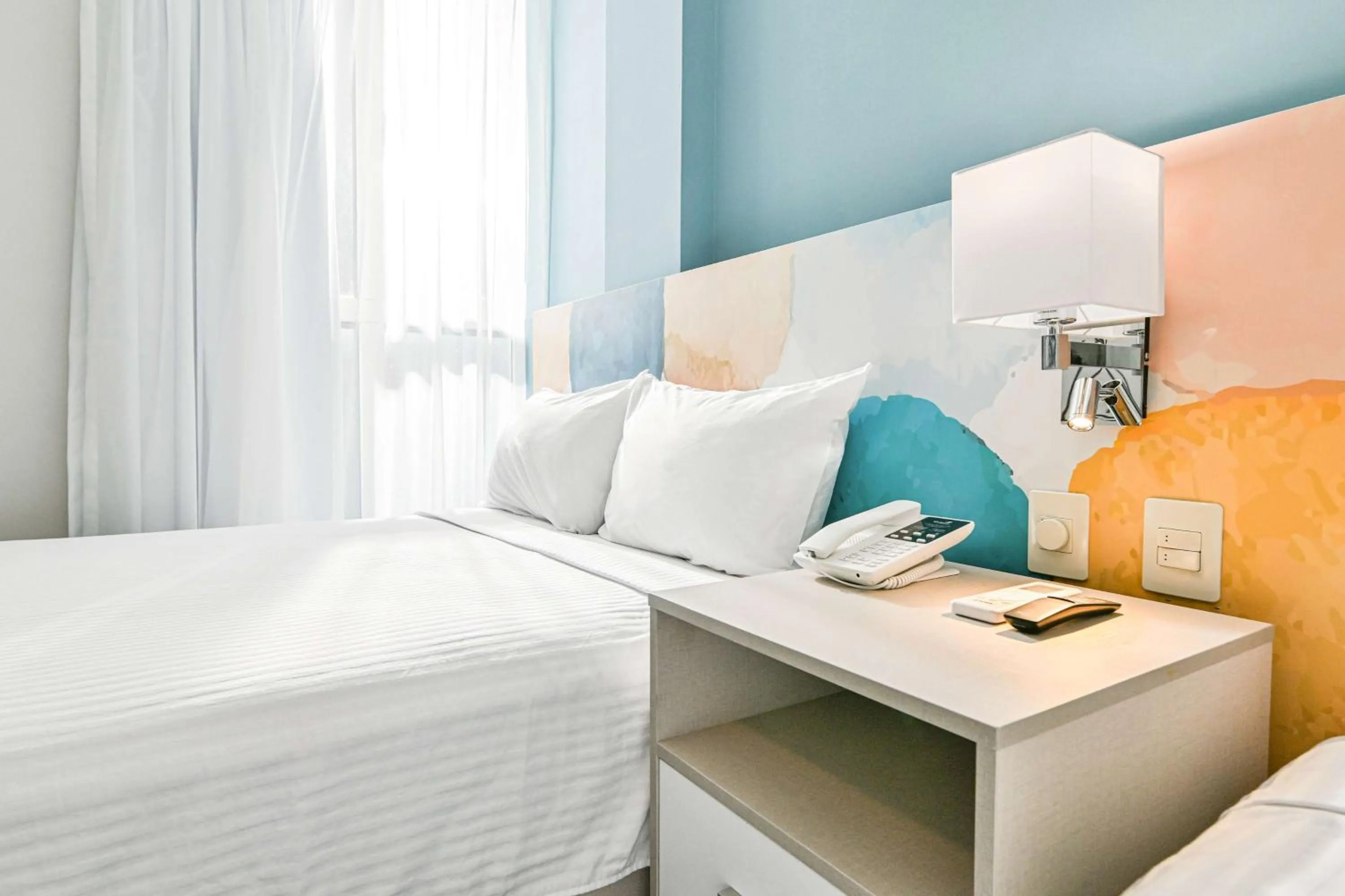 Bedroom, Bed in Vista Express Guadalajara Expo SureStay Collection by BW