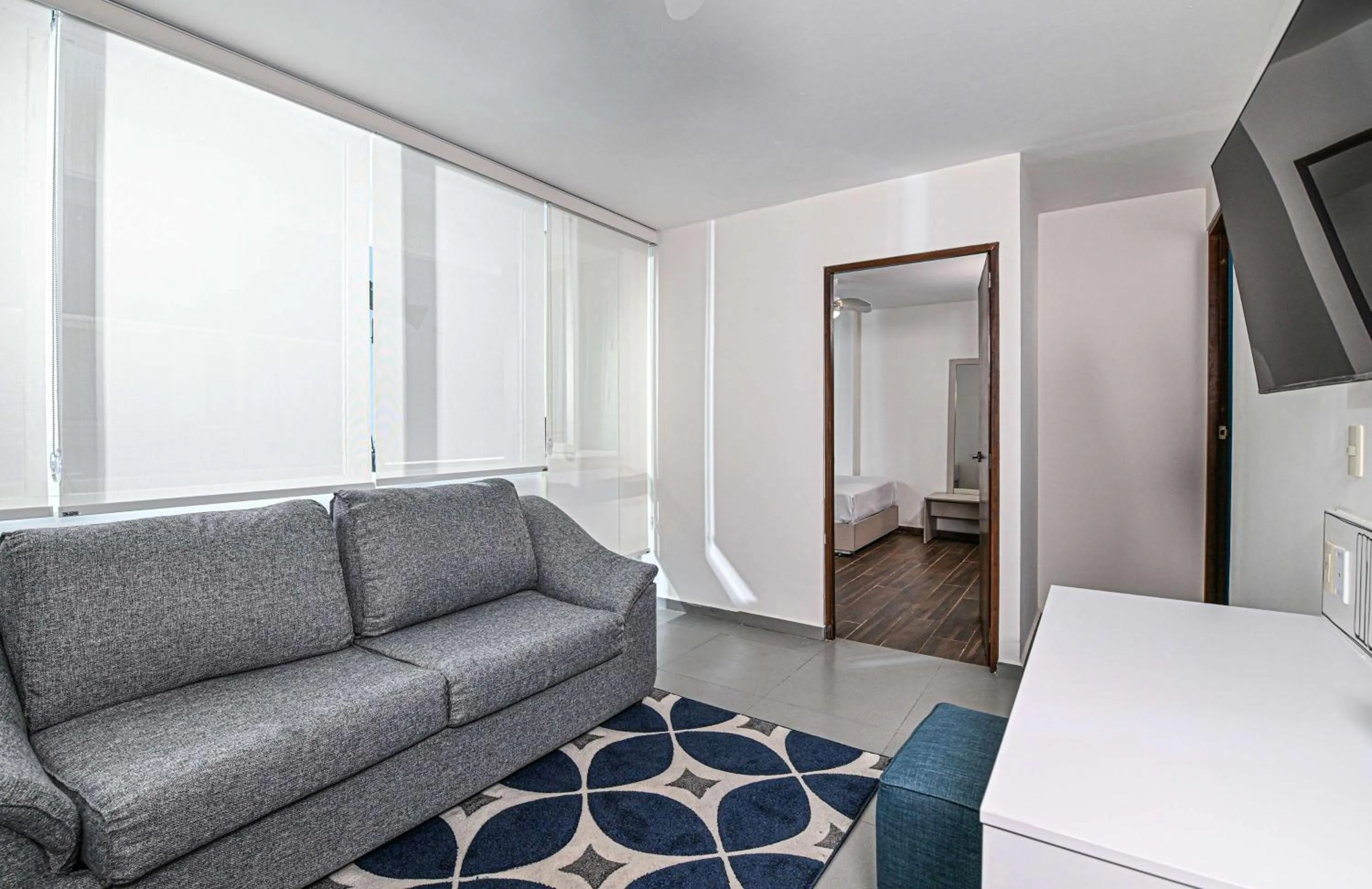 Bedroom in Vista Express Guadalajara Expo SureStay Collection by BW