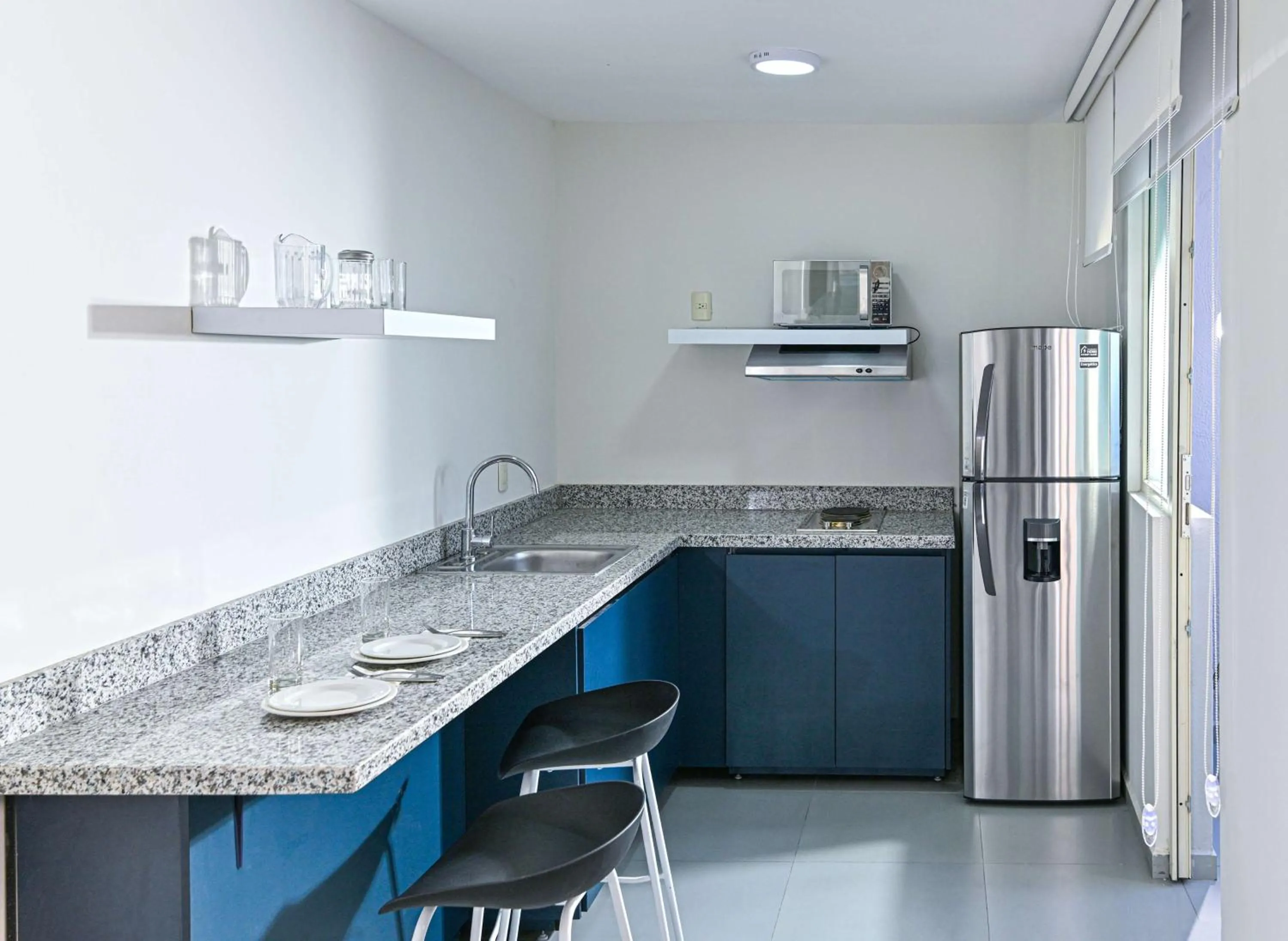 Photo of the whole room in Vista Express Guadalajara Expo SureStay Collection by BW