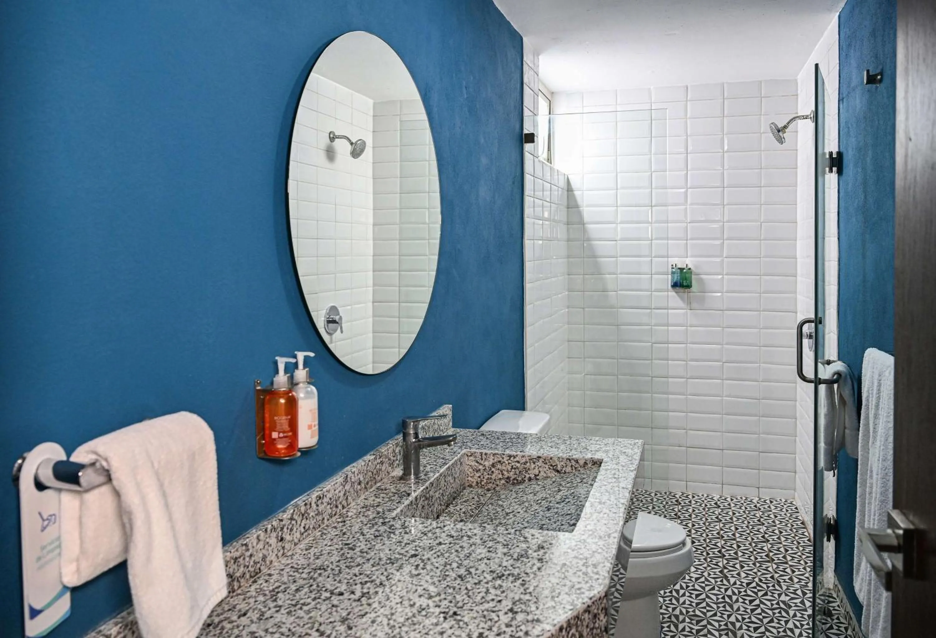 Bathroom in Vista Express Guadalajara Expo SureStay Collection by BW