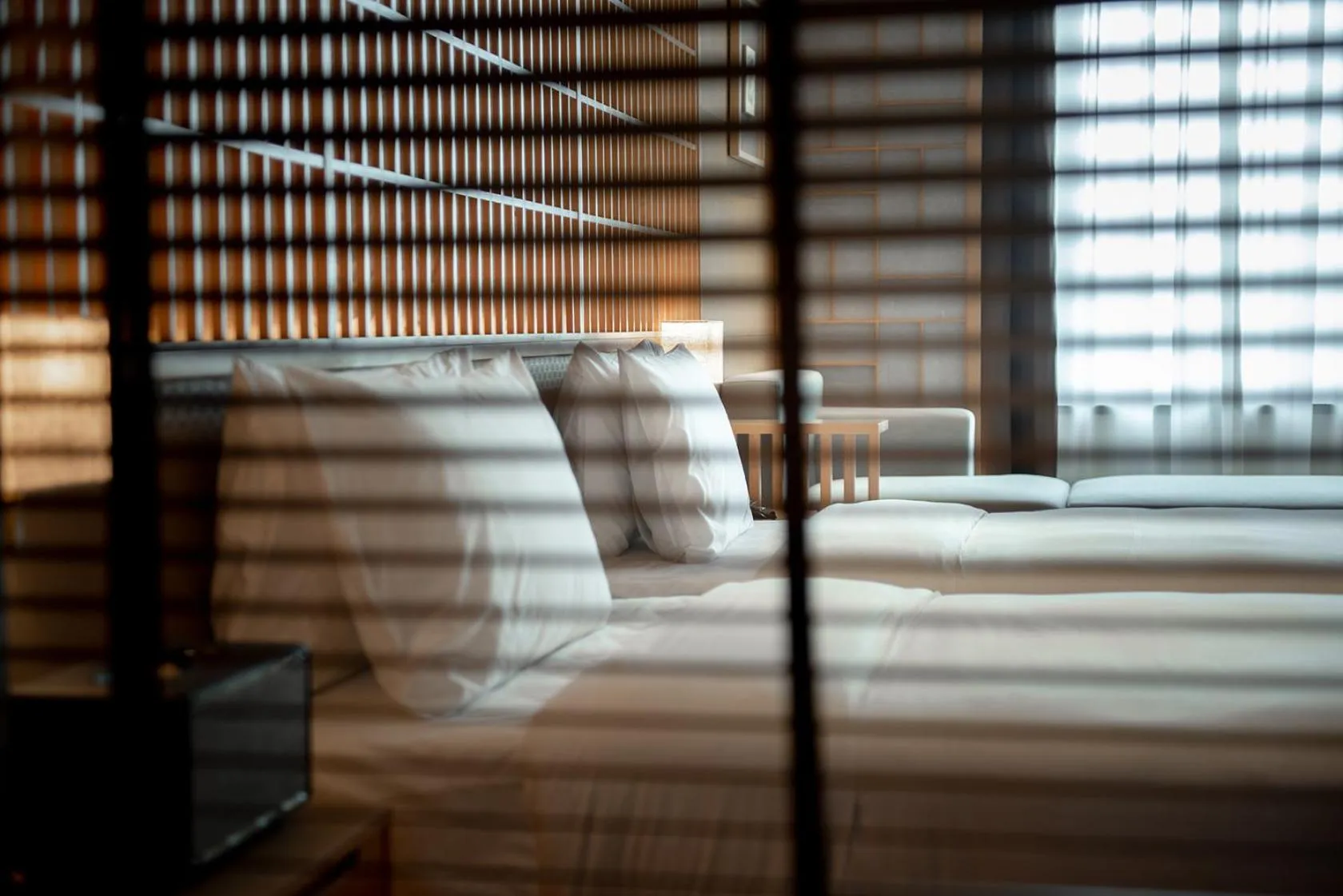 Bed in Hyakumangoku Onsen Hotel