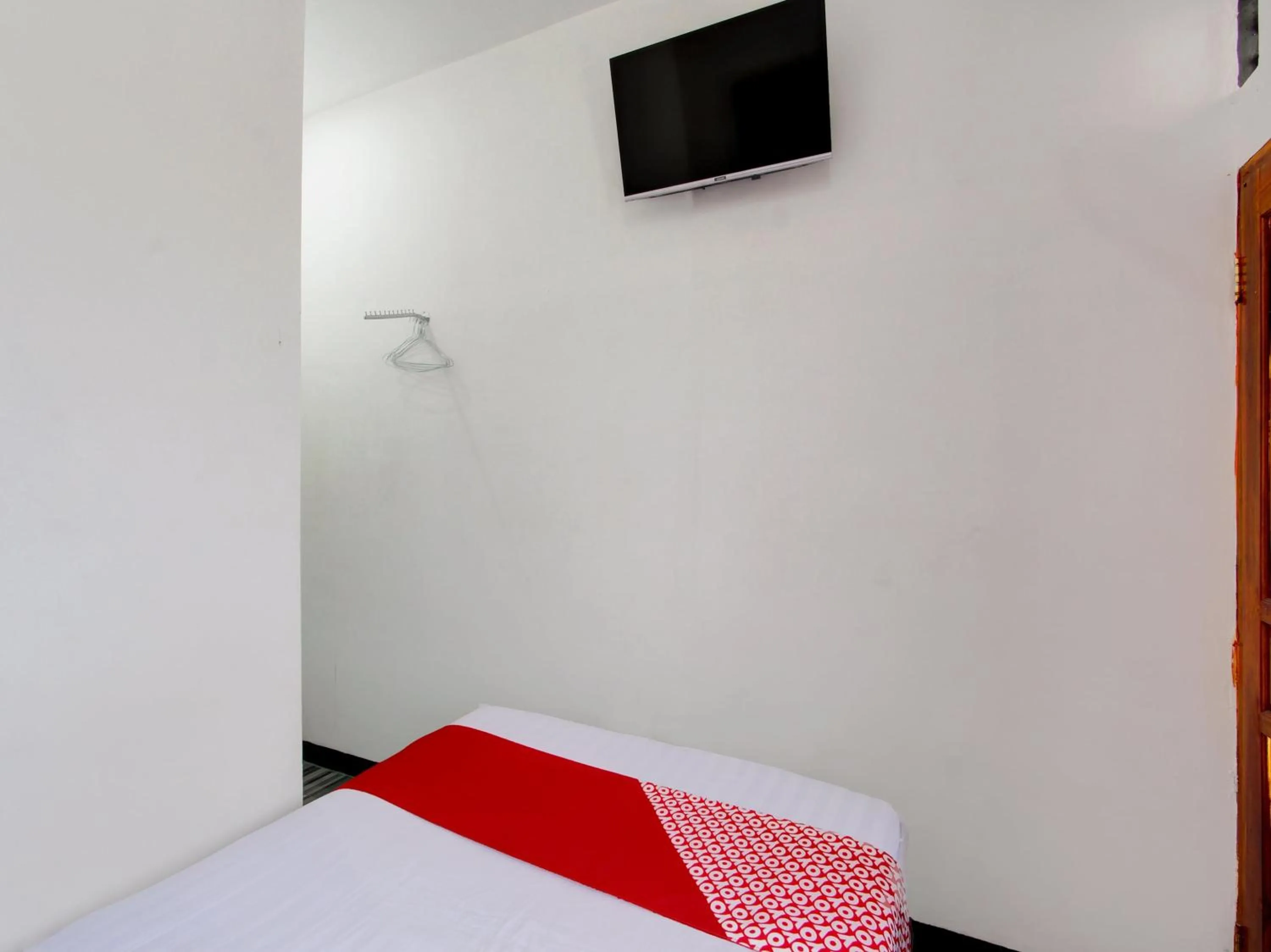 Bedroom in OYO 93188 Soren Hotel And Coffee