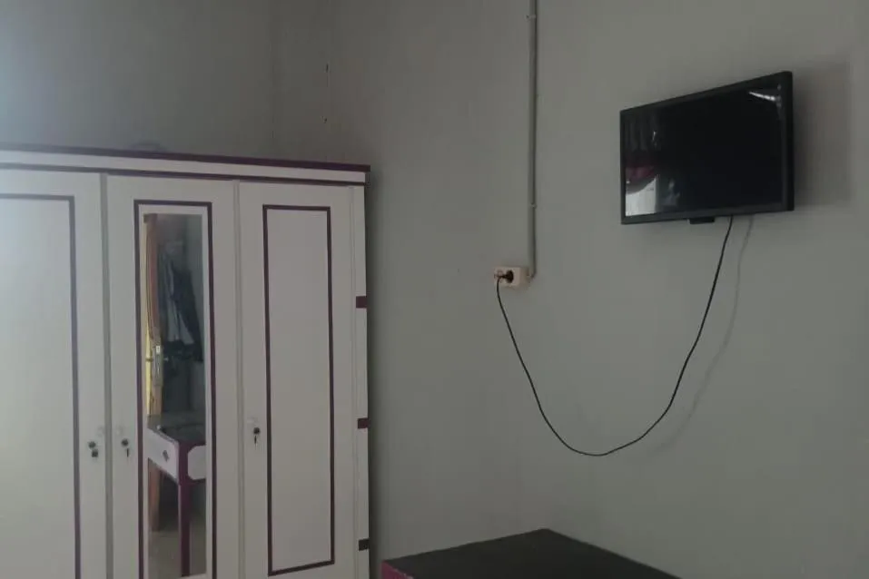 Bedroom in Hotel O Andesta Guest House SyariahNearAgrowisata Sungai Pinang Agro Nadin