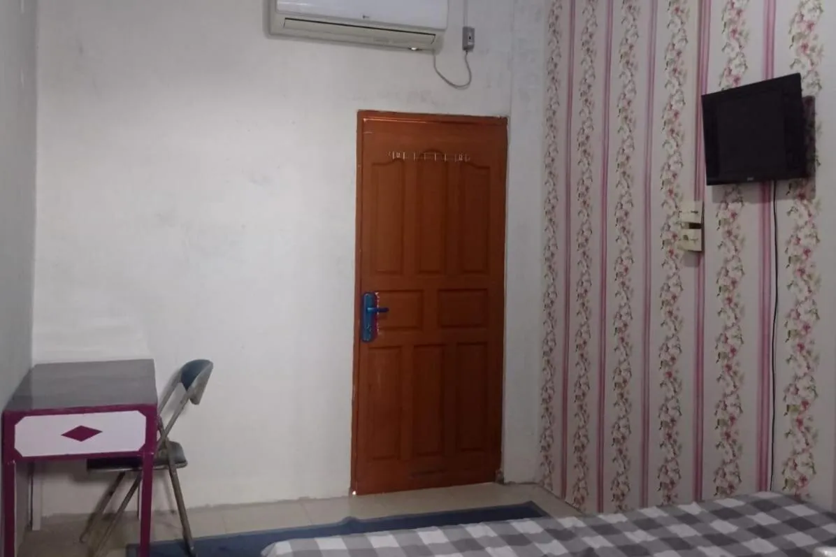 Bedroom in Hotel O Andesta Guest House SyariahNearAgrowisata Sungai Pinang Agro Nadin
