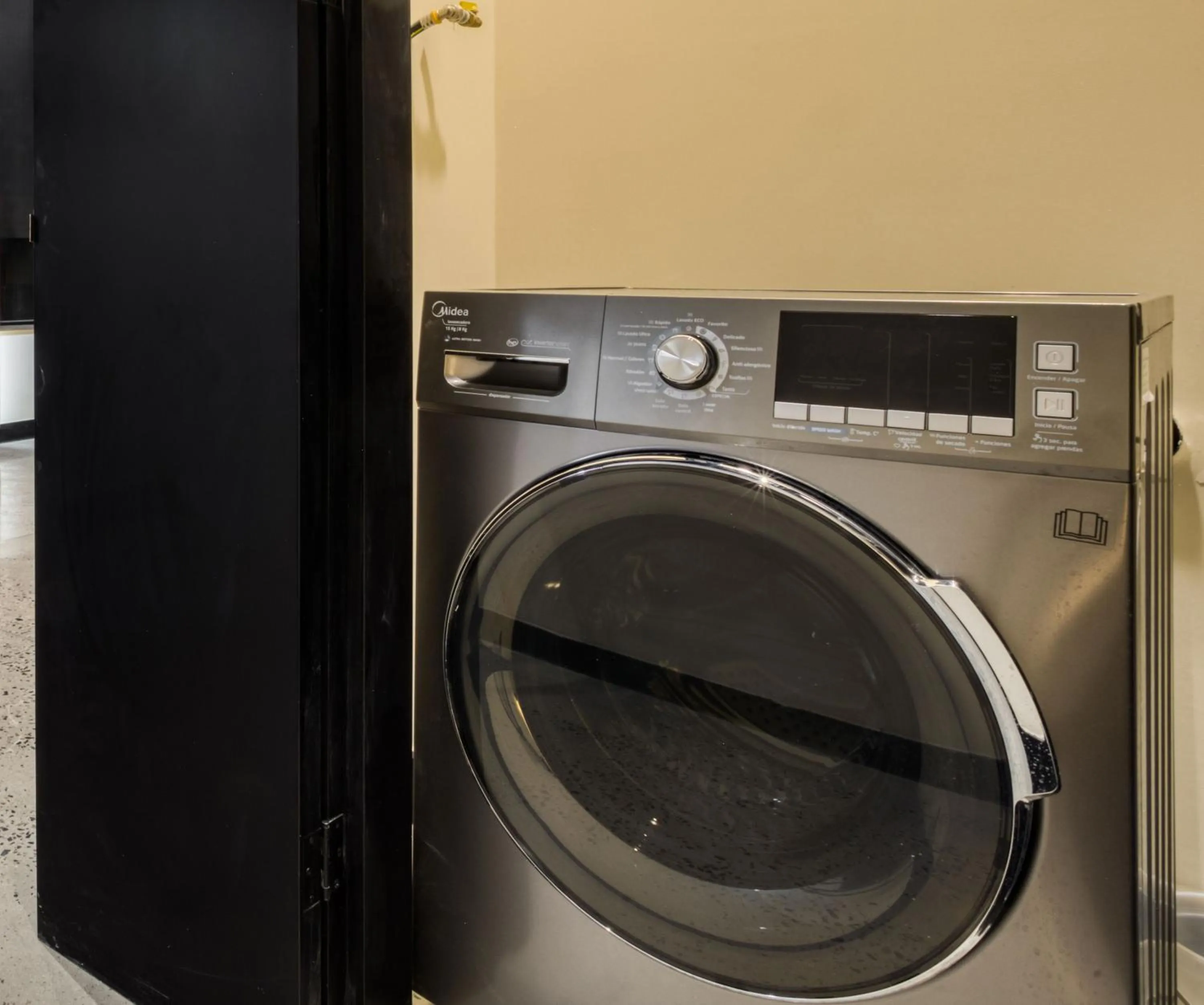 laundry in Downtown Loft by ULIV