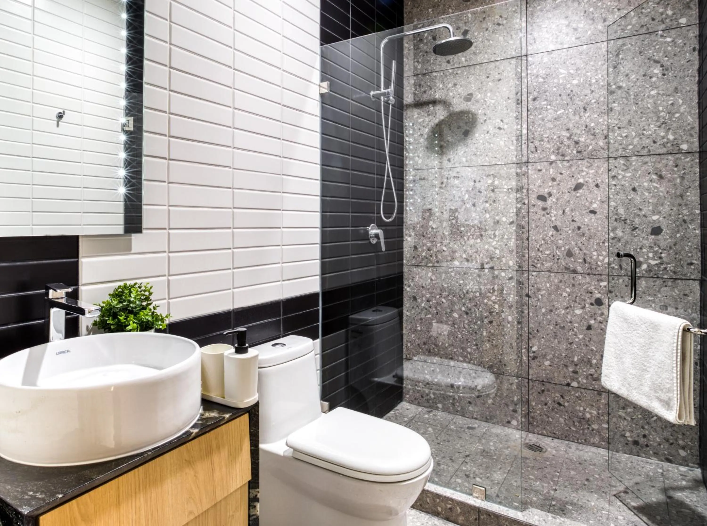 Toilet in Downtown Designer Apartments by ULIV