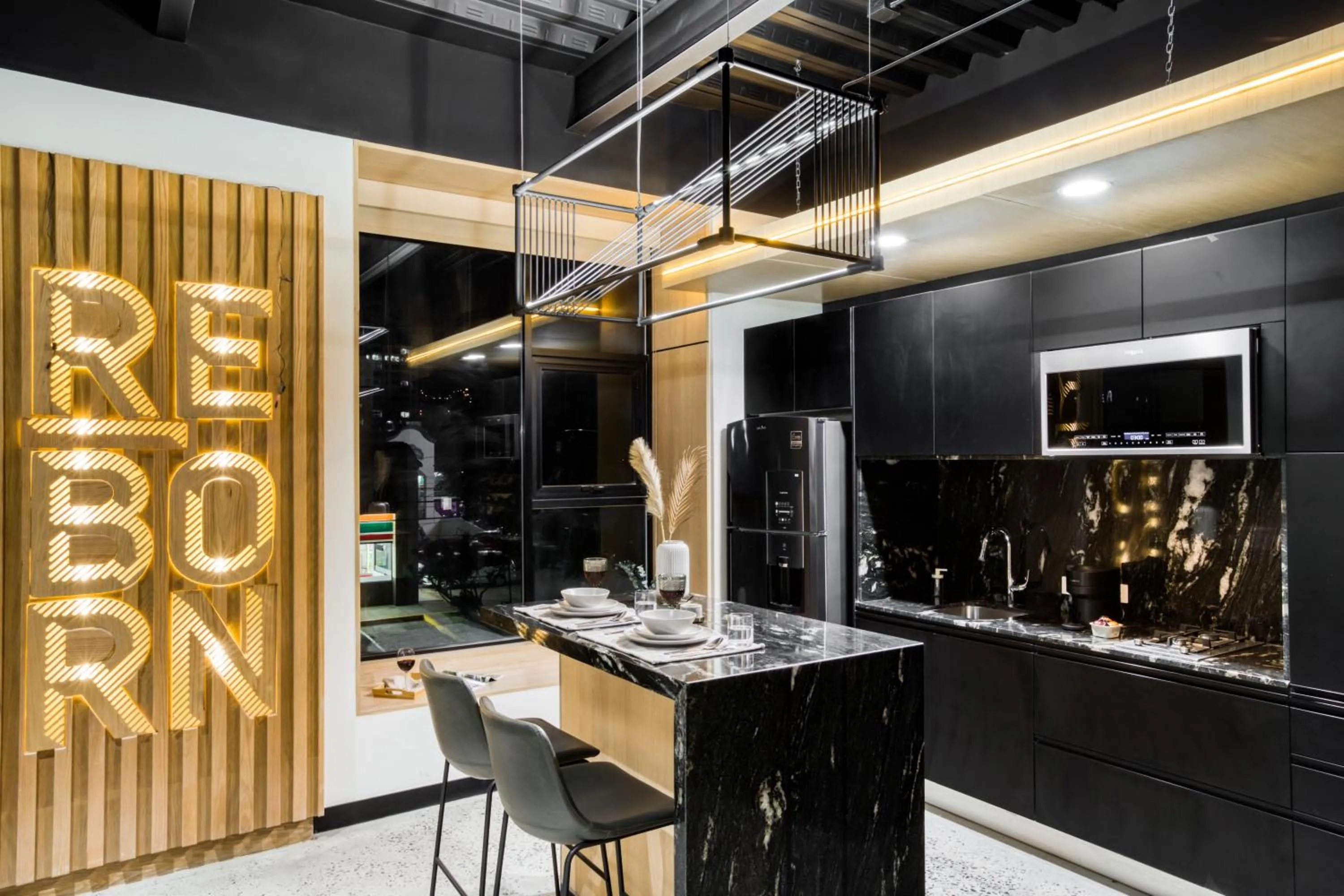 kitchen in Downtown Designer Apartments by ULIV