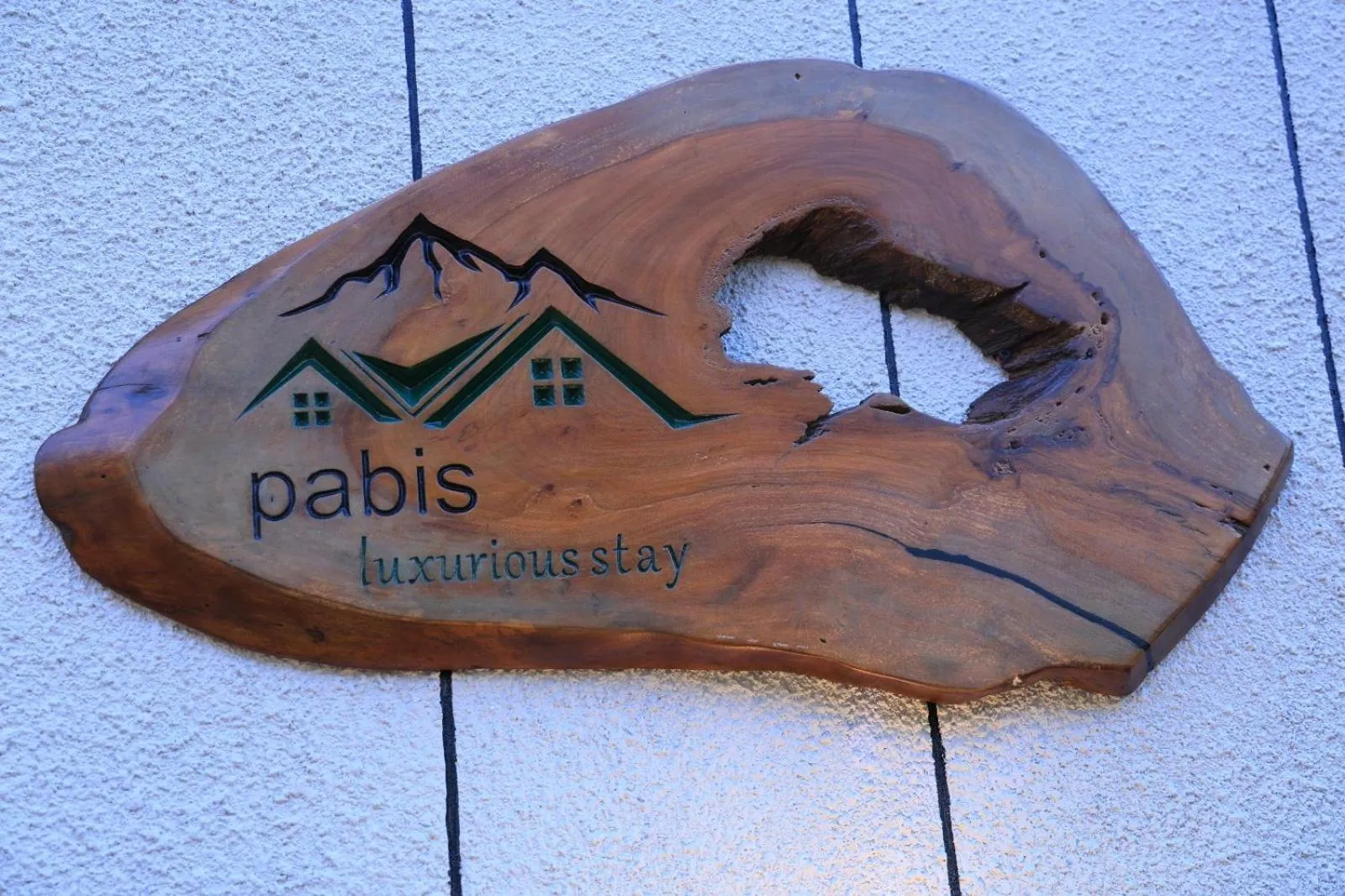 Property logo or sign in Pabis luxurious stay