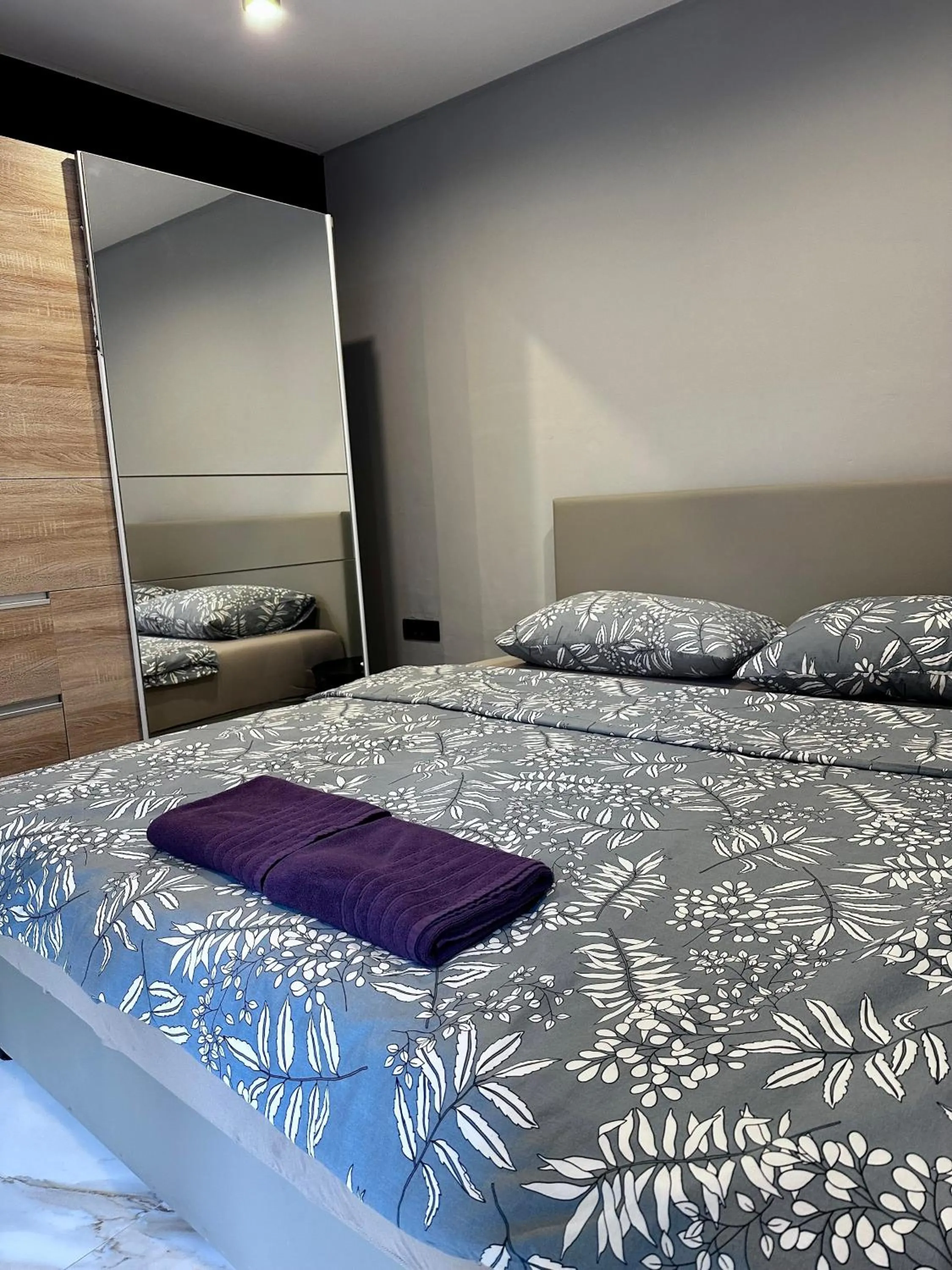 Bed in Allegra Rooms