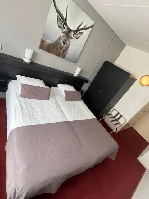 Bedroom, Bed in Landgoed Stakenberg - Hotel & Bungalows