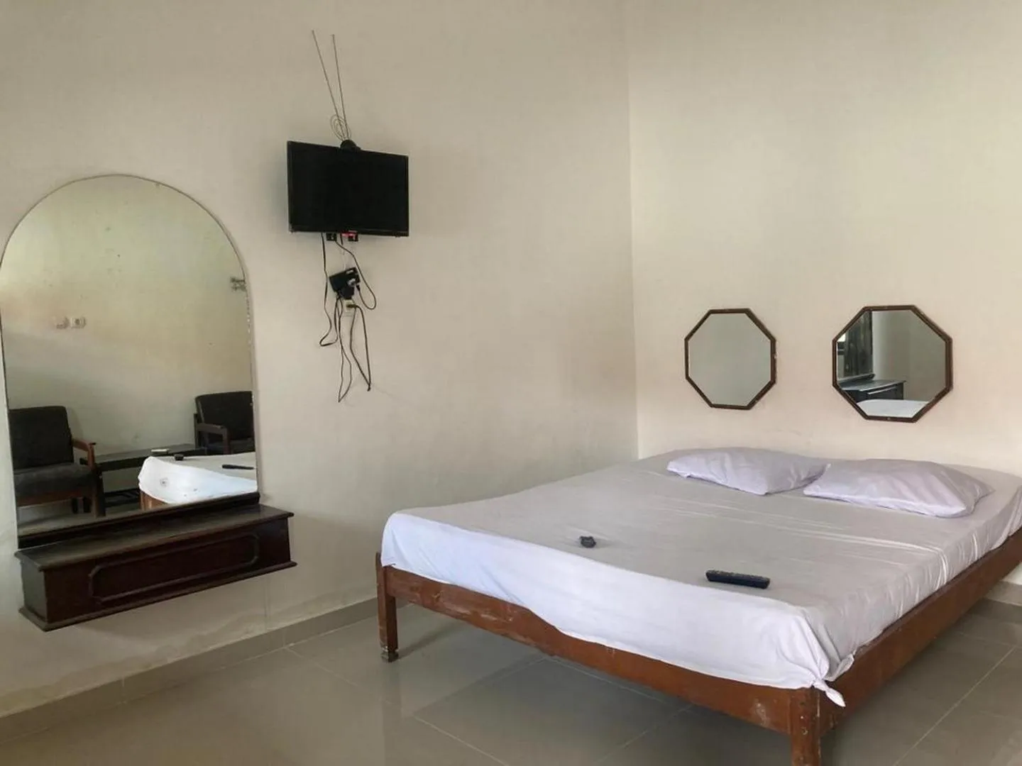 Bedroom, Bed in Hotel Surya Citra Jogja A Mitra RedDoorz