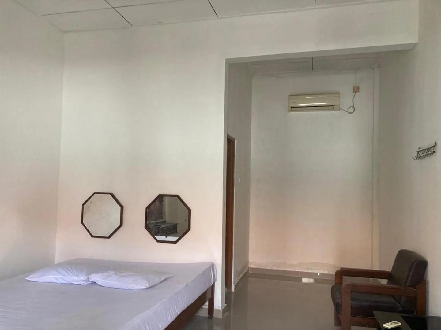 Bedroom, Bed in Hotel Surya Citra Jogja A Mitra RedDoorz