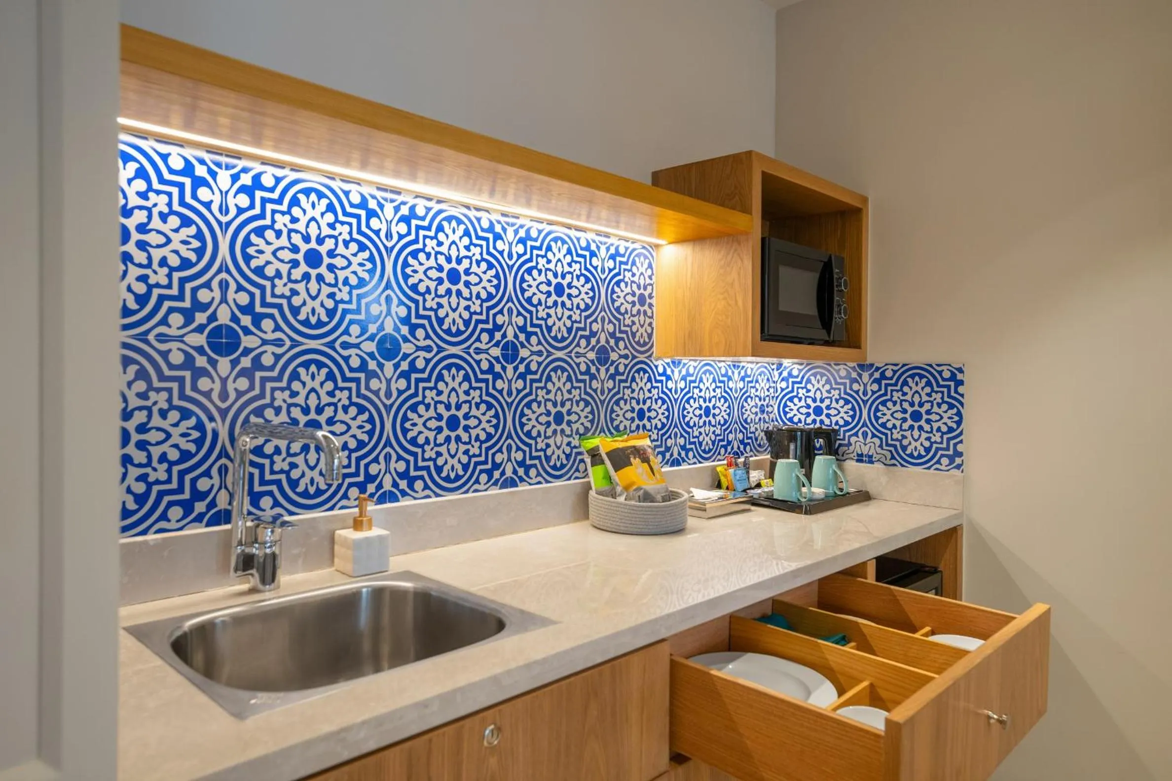 Kitchen or kitchenette in The Astor - All Suites Hotel Candolim Goa