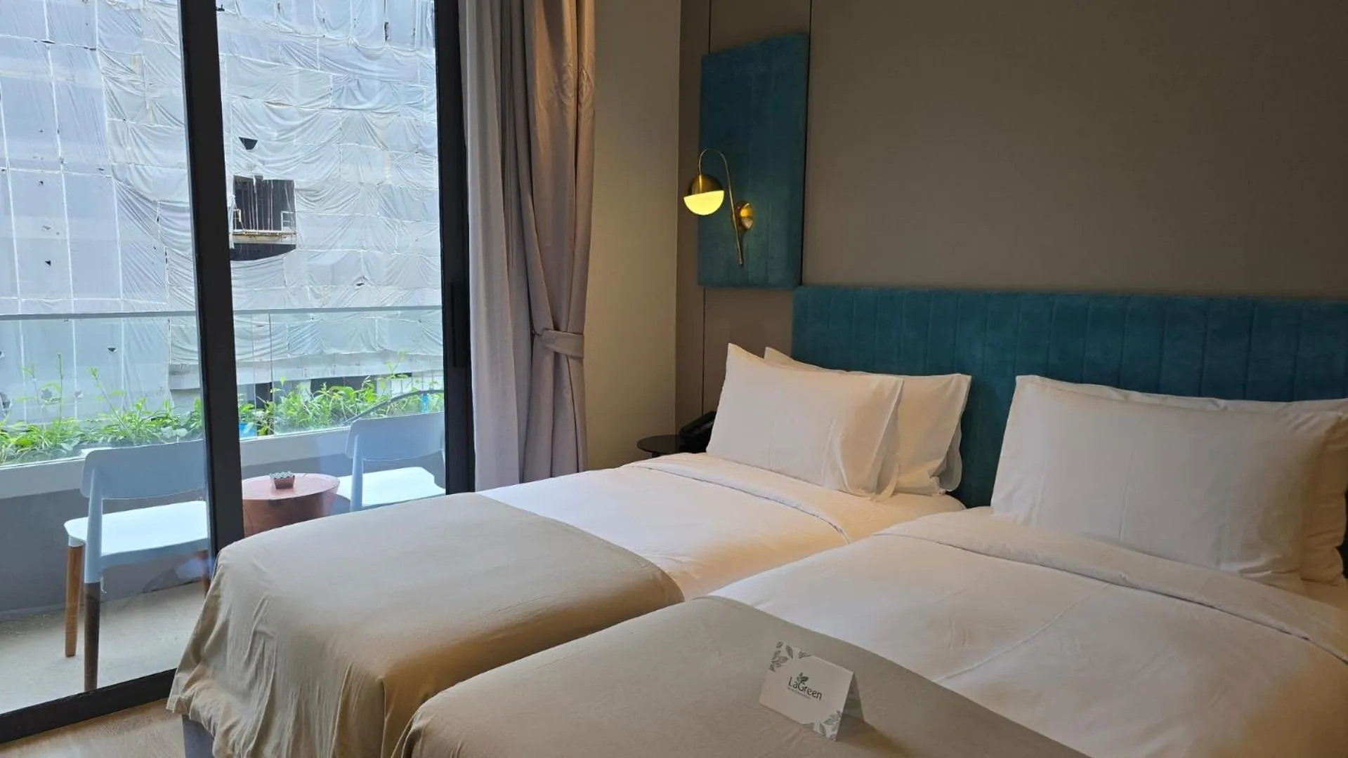 View (from property/room), Bed in La Green Hotel and Residence