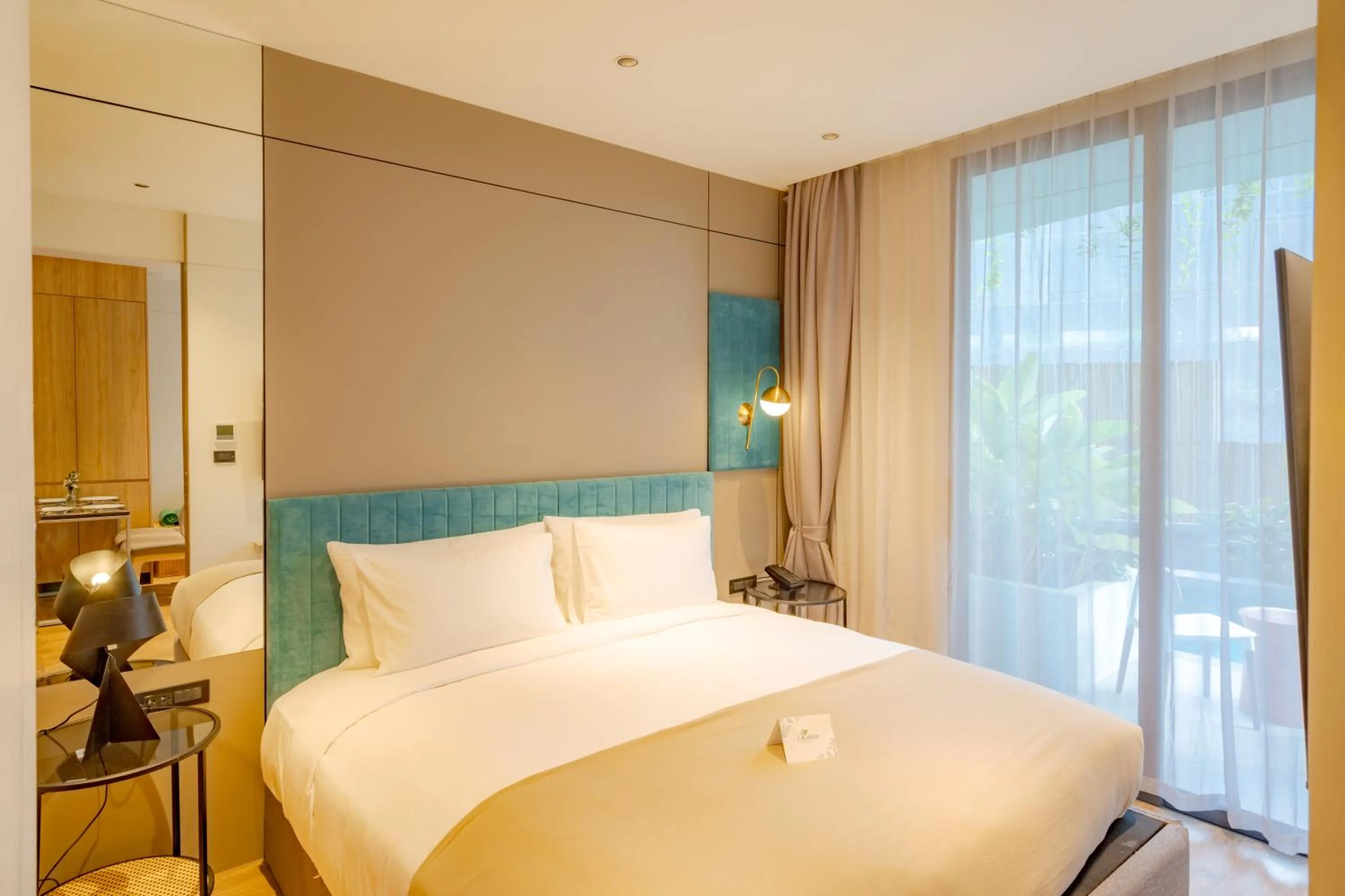 Bed in La Green Hotel and Residence