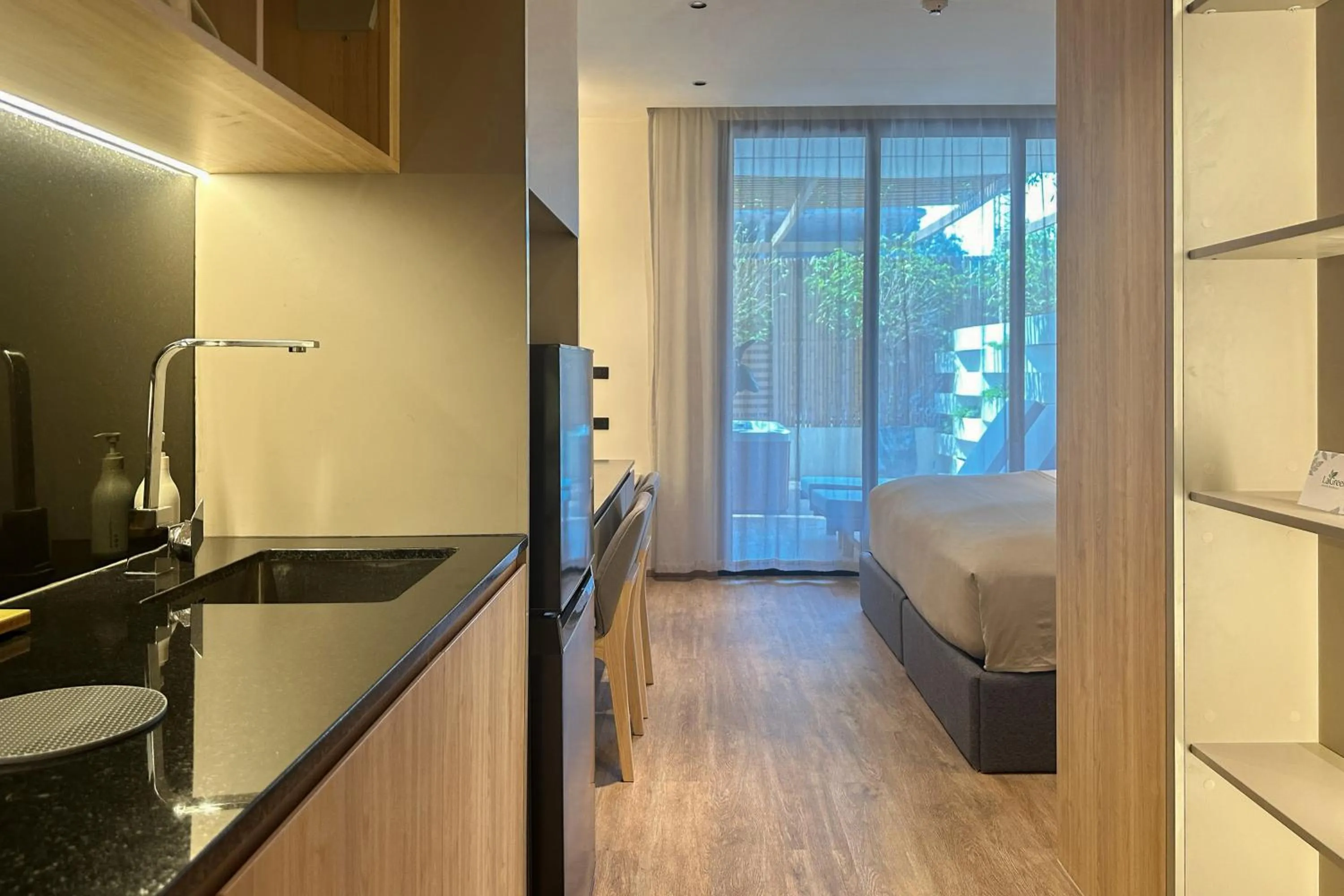 Bed in La Green Hotel and Residence