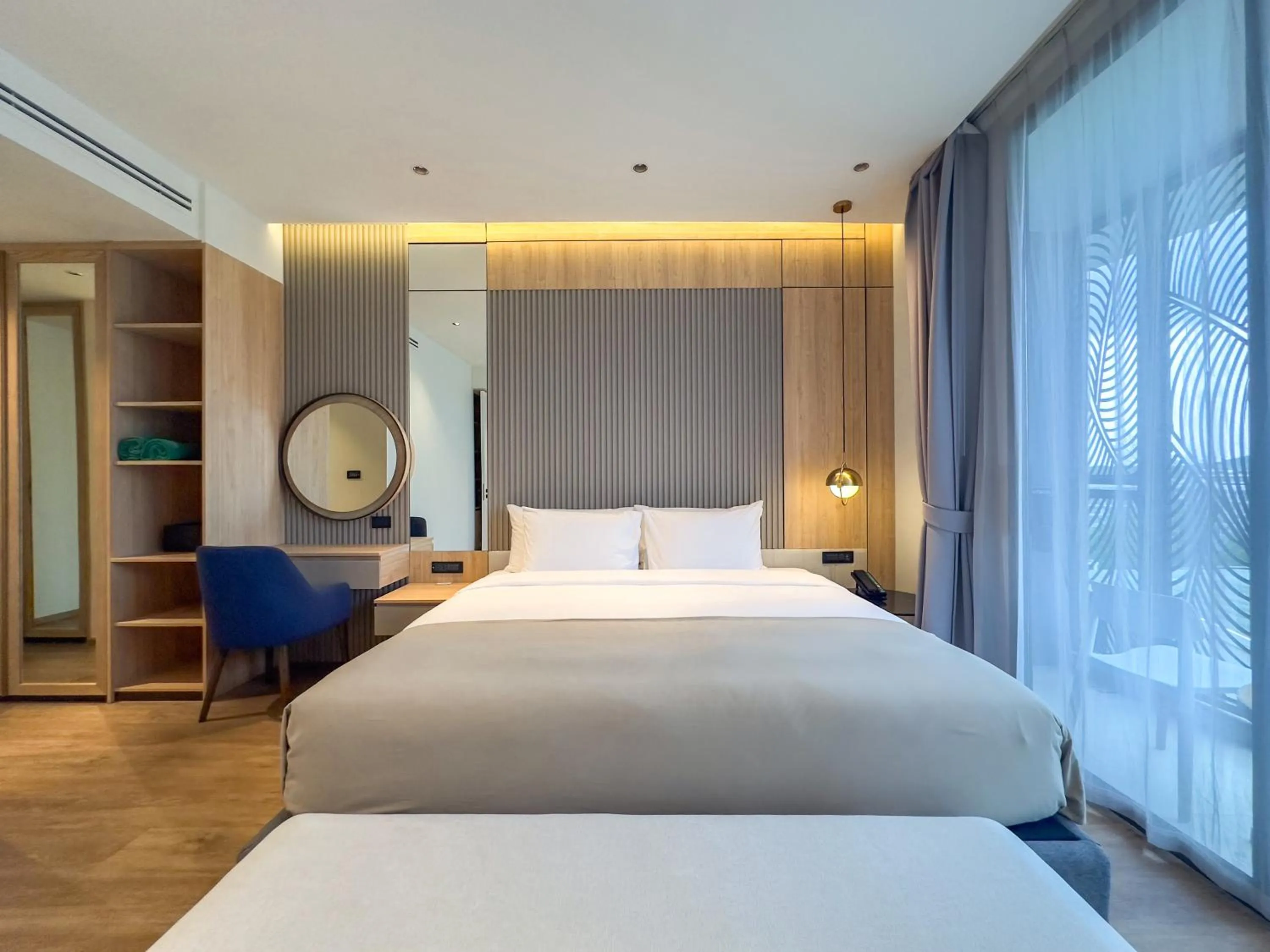 Bed in La Green Hotel and Residence