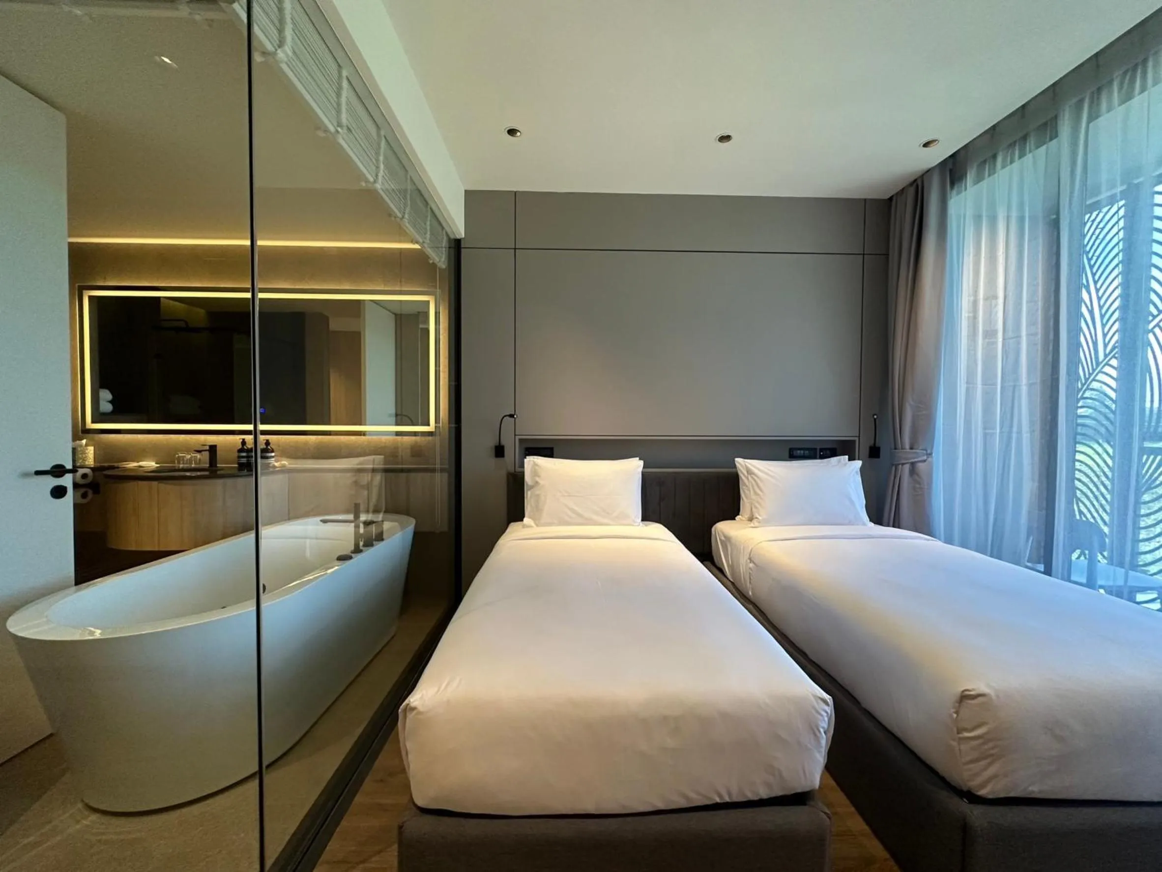Bed in La Green Hotel and Residence