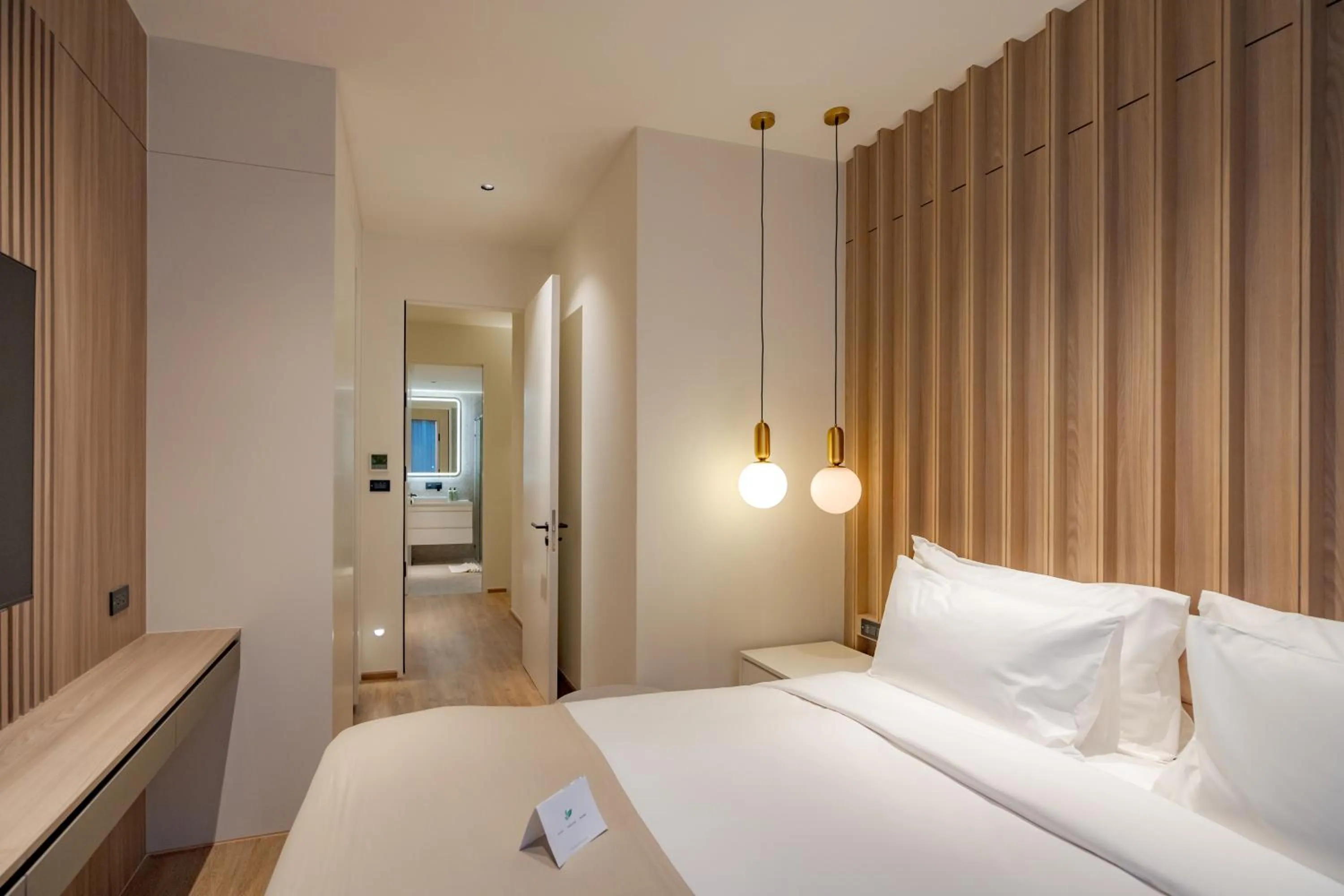 Bed in La Green Hotel and Residence