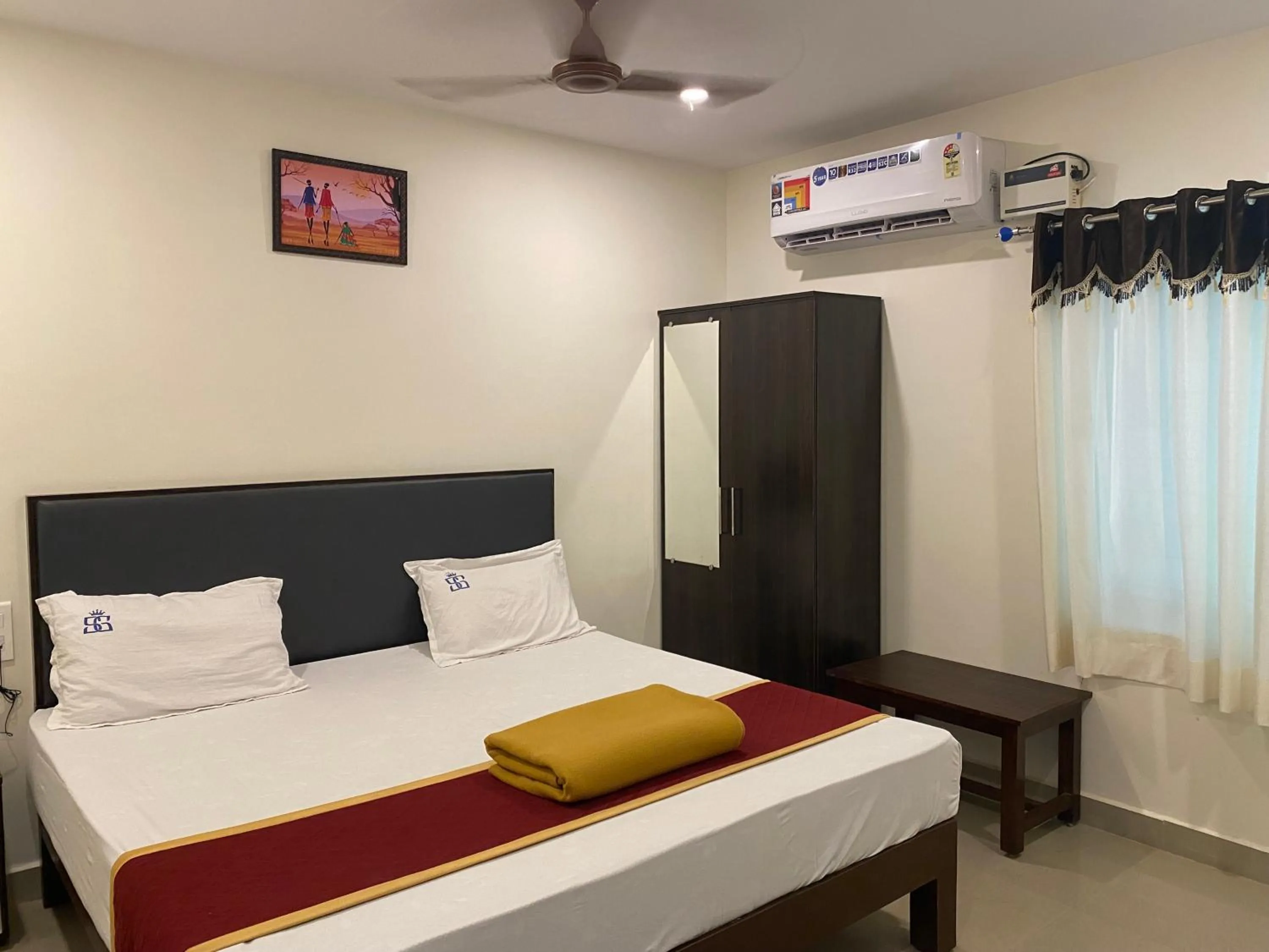 Bed in Hotel Sitar Grand