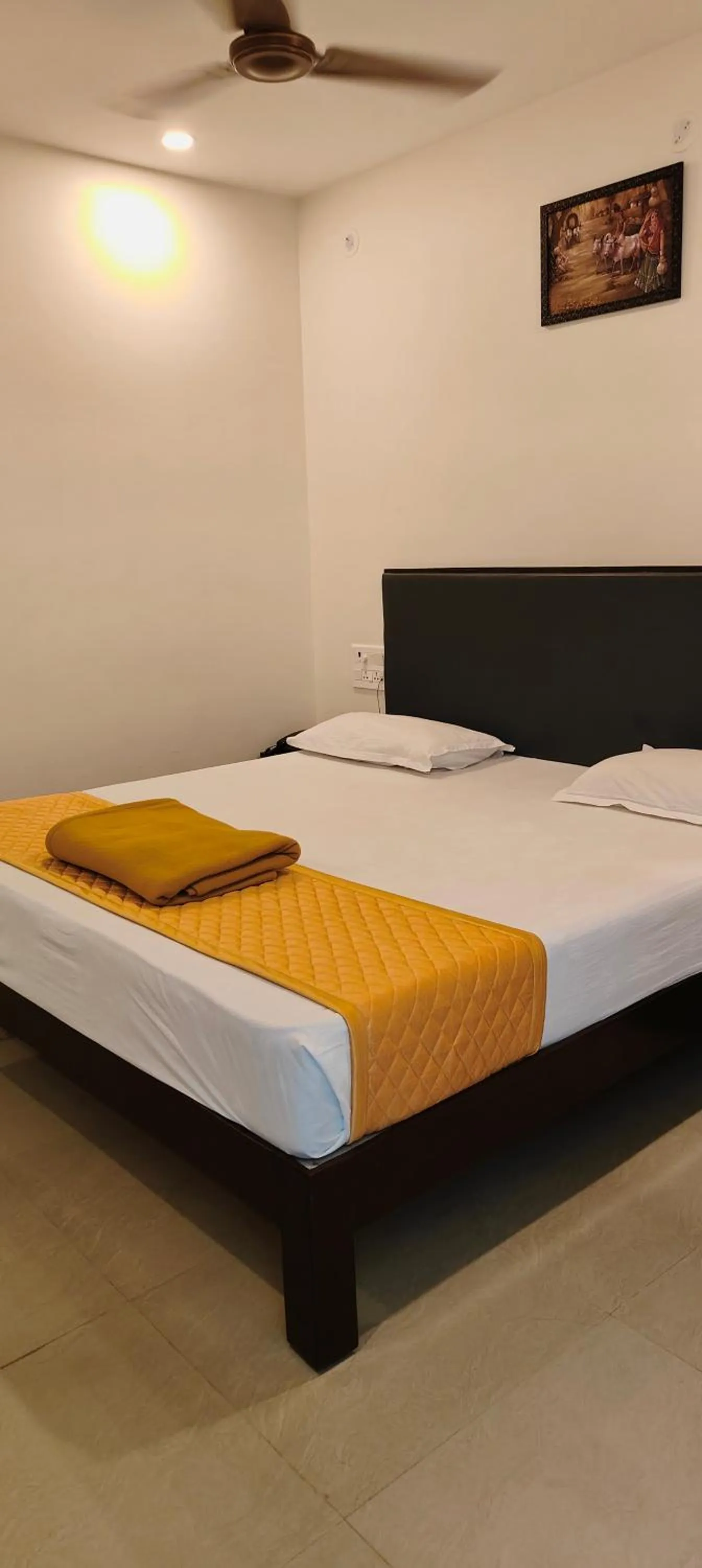 Bed in Hotel Sitar Grand