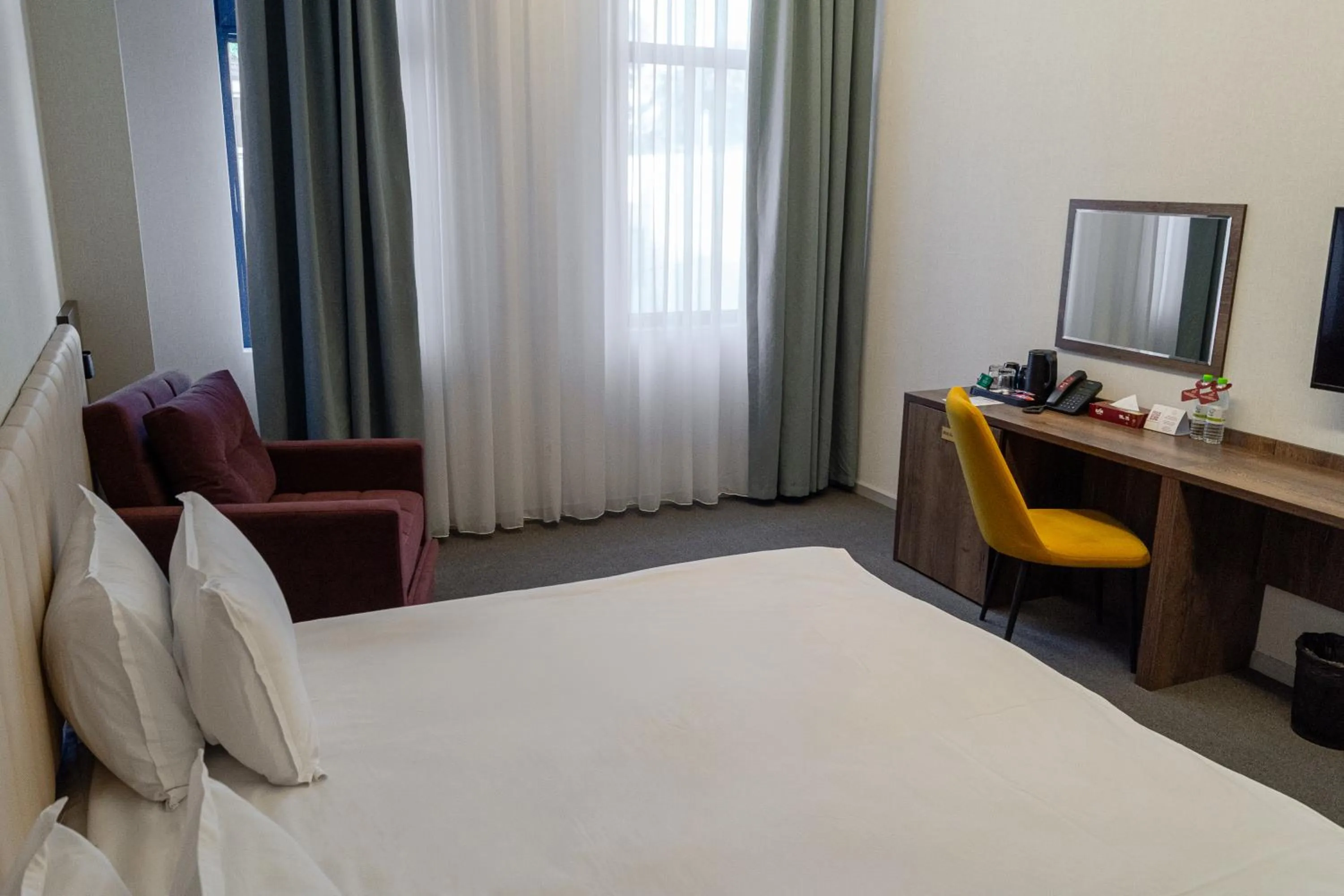 Bed in Grand Plaza Hotel Samarkand