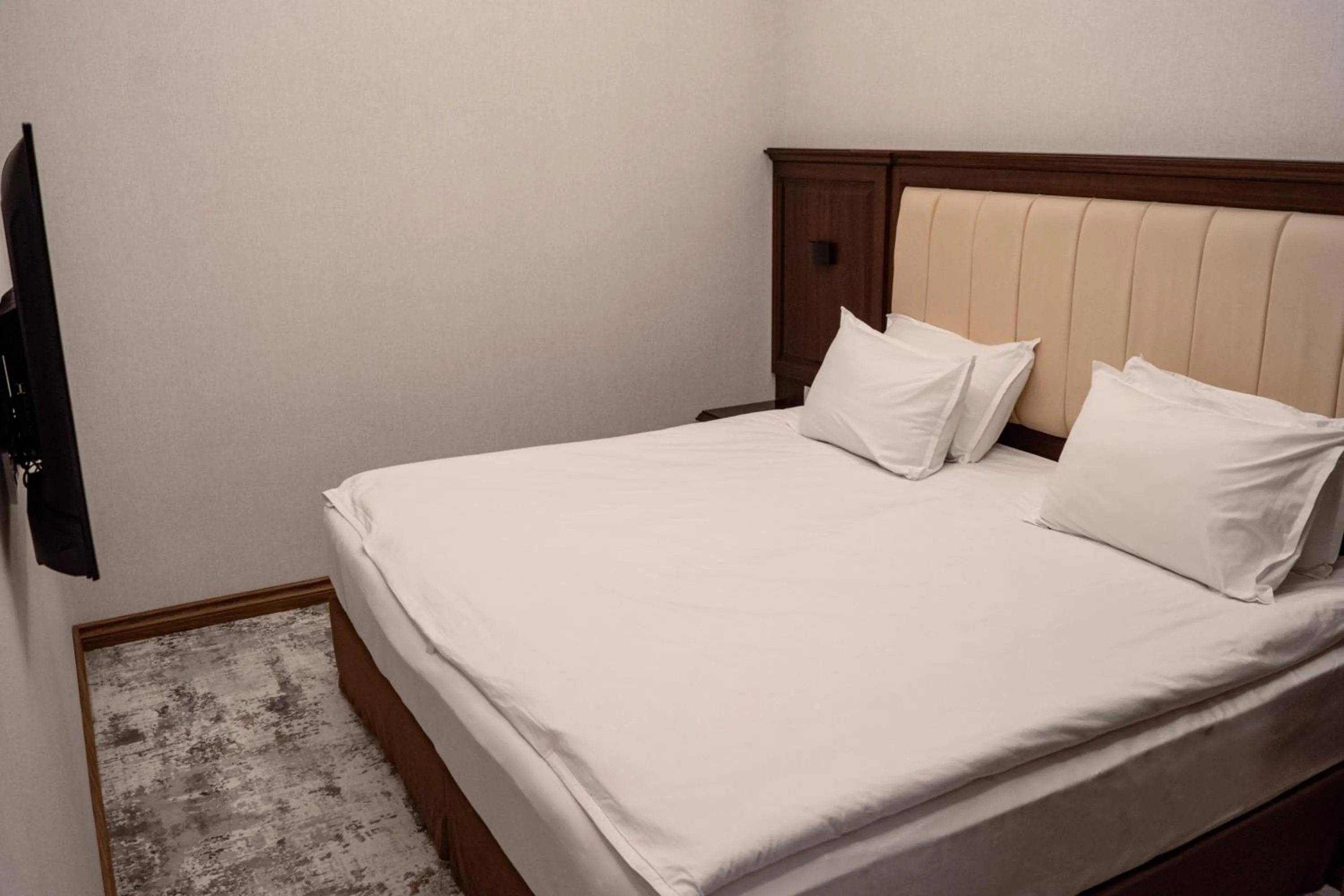 Bed in Grand Plaza Hotel Samarkand