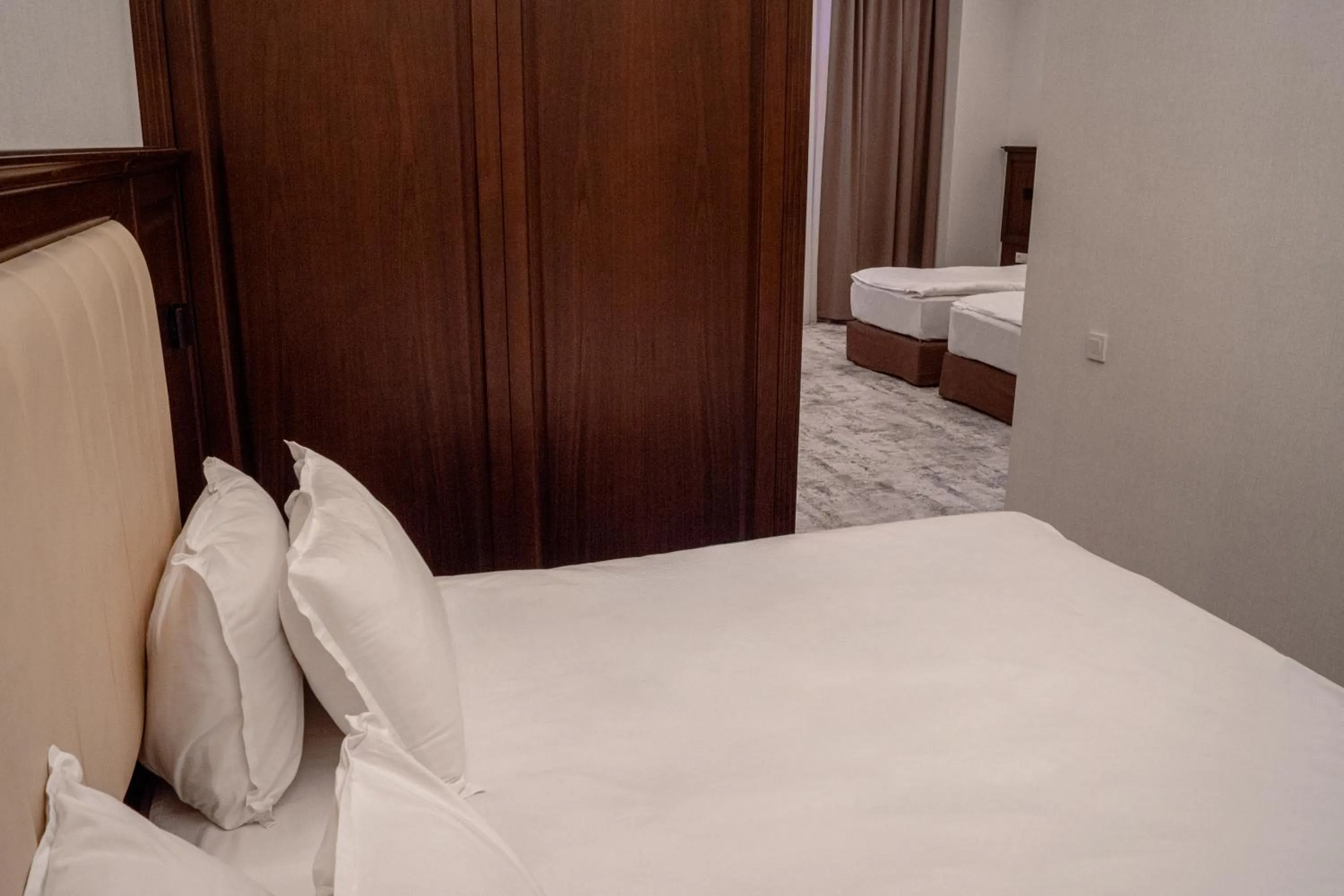 Bed in Grand Plaza Hotel Samarkand