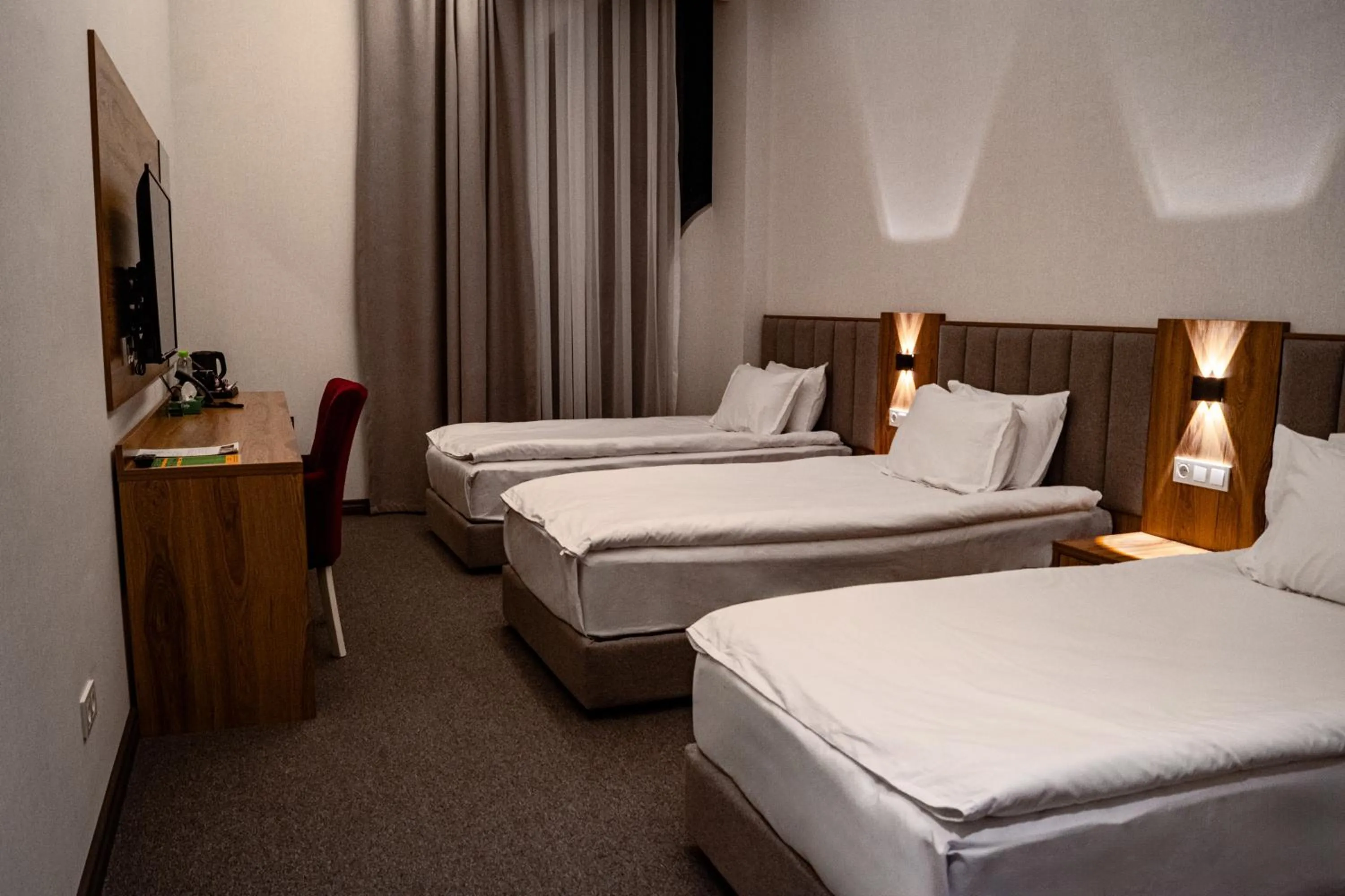 Bed in Grand Plaza Hotel Samarkand