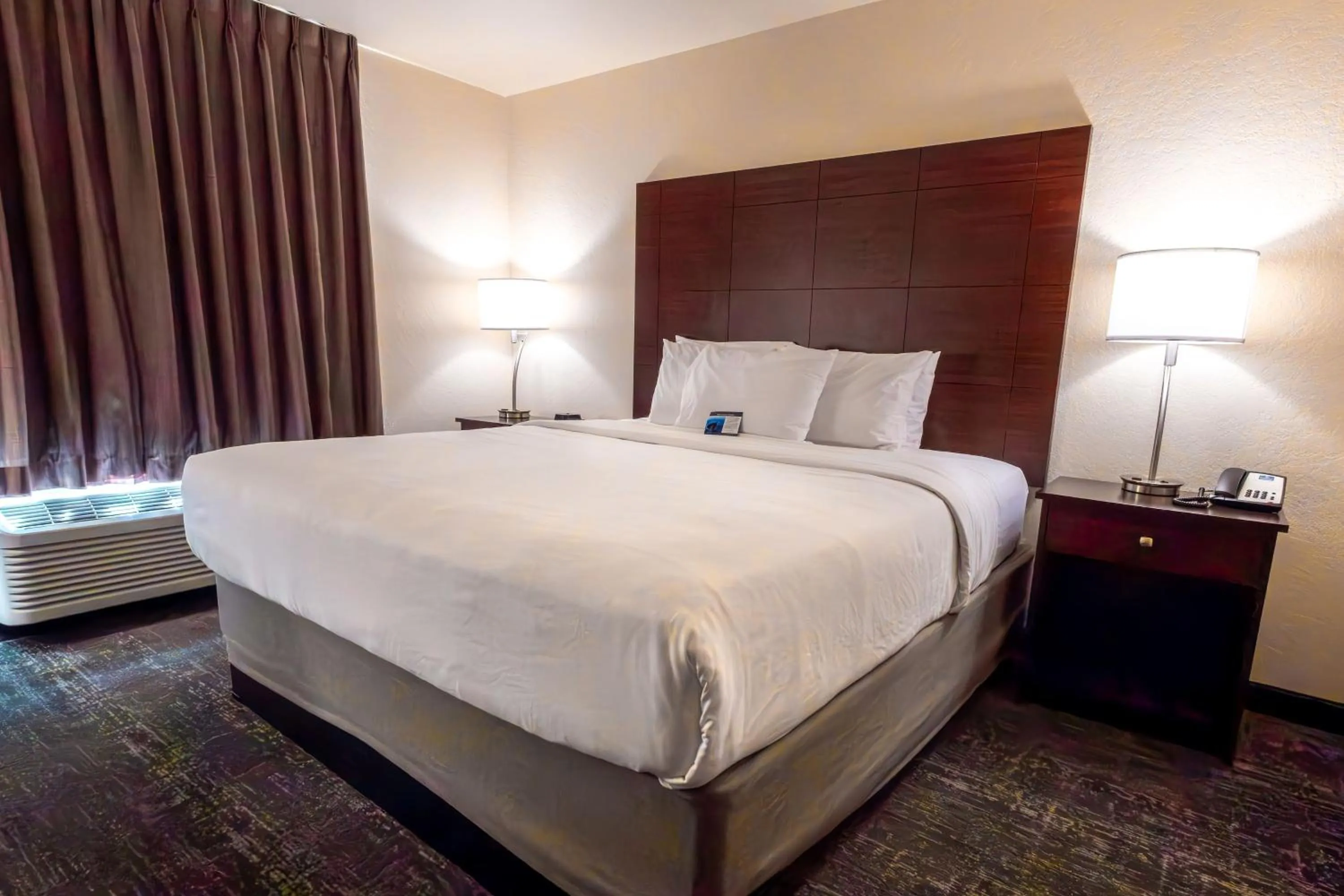 Bedroom, Bed in Cobblestone Inn & Suites - Big Lake